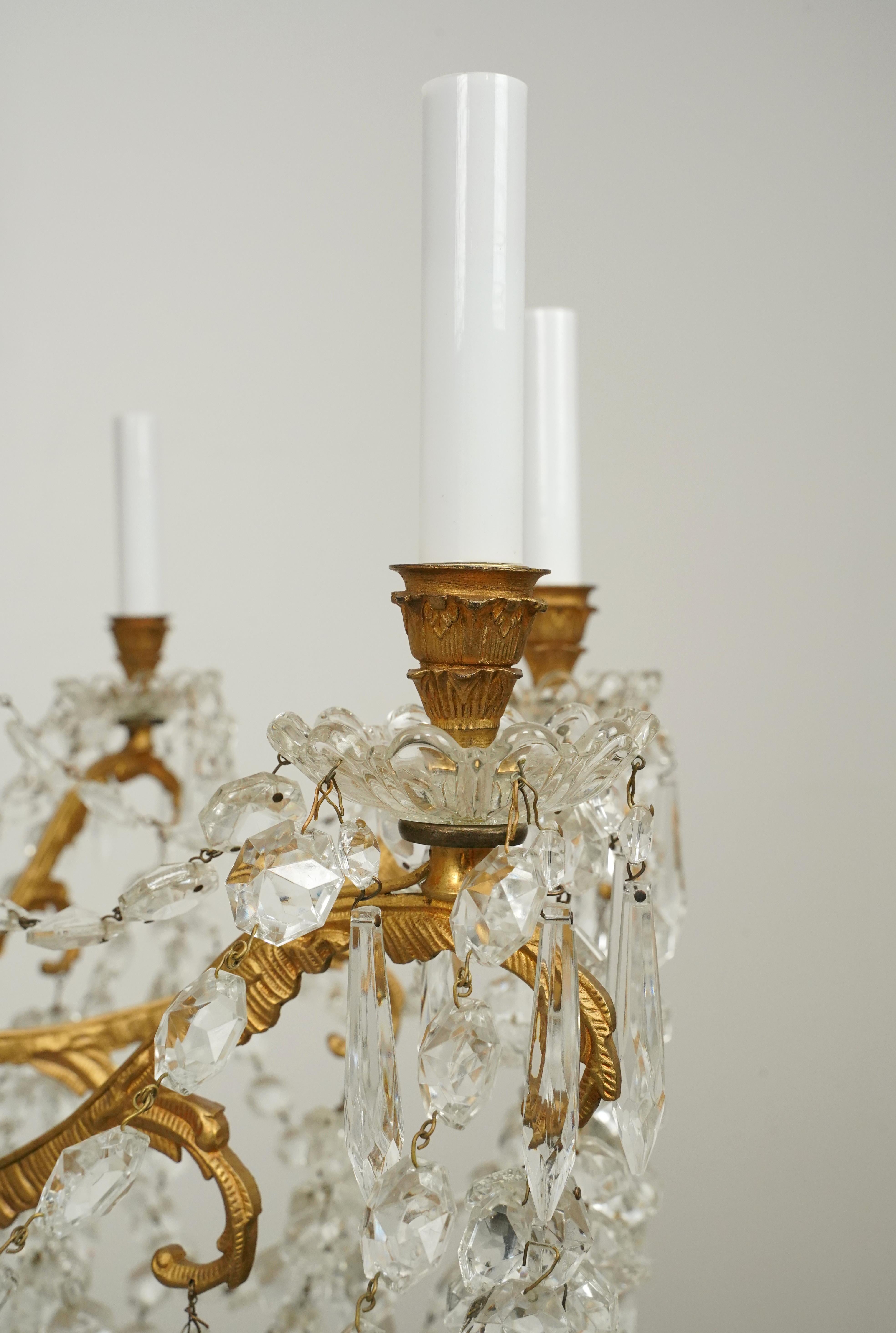 Waldorf Astoria 8 Arm Crystal Beaded & Brass Chandelier In Good Condition For Sale In New York, NY