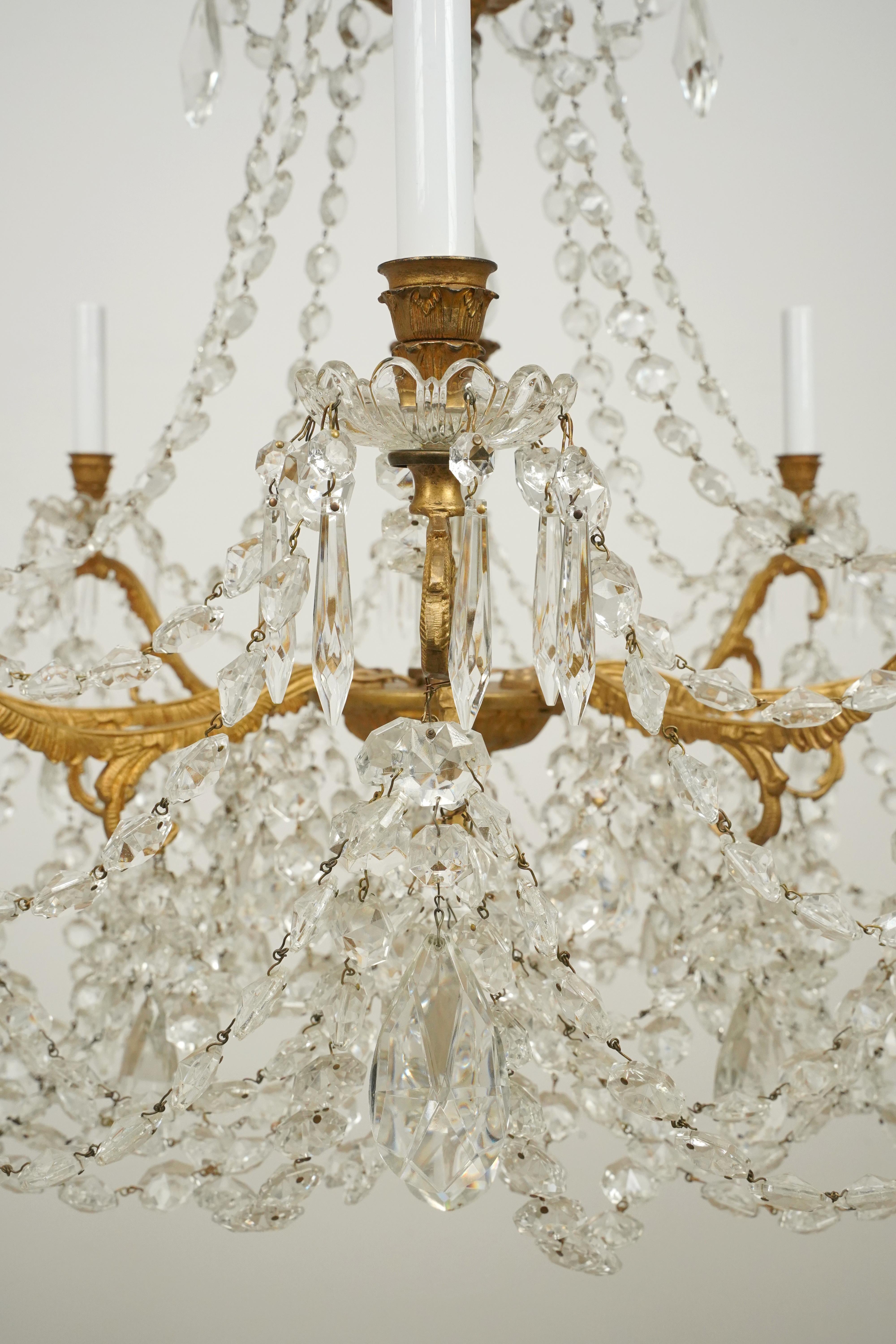 Waldorf Astoria 8 Arm Crystal Beaded & Brass Chandelier For Sale 1