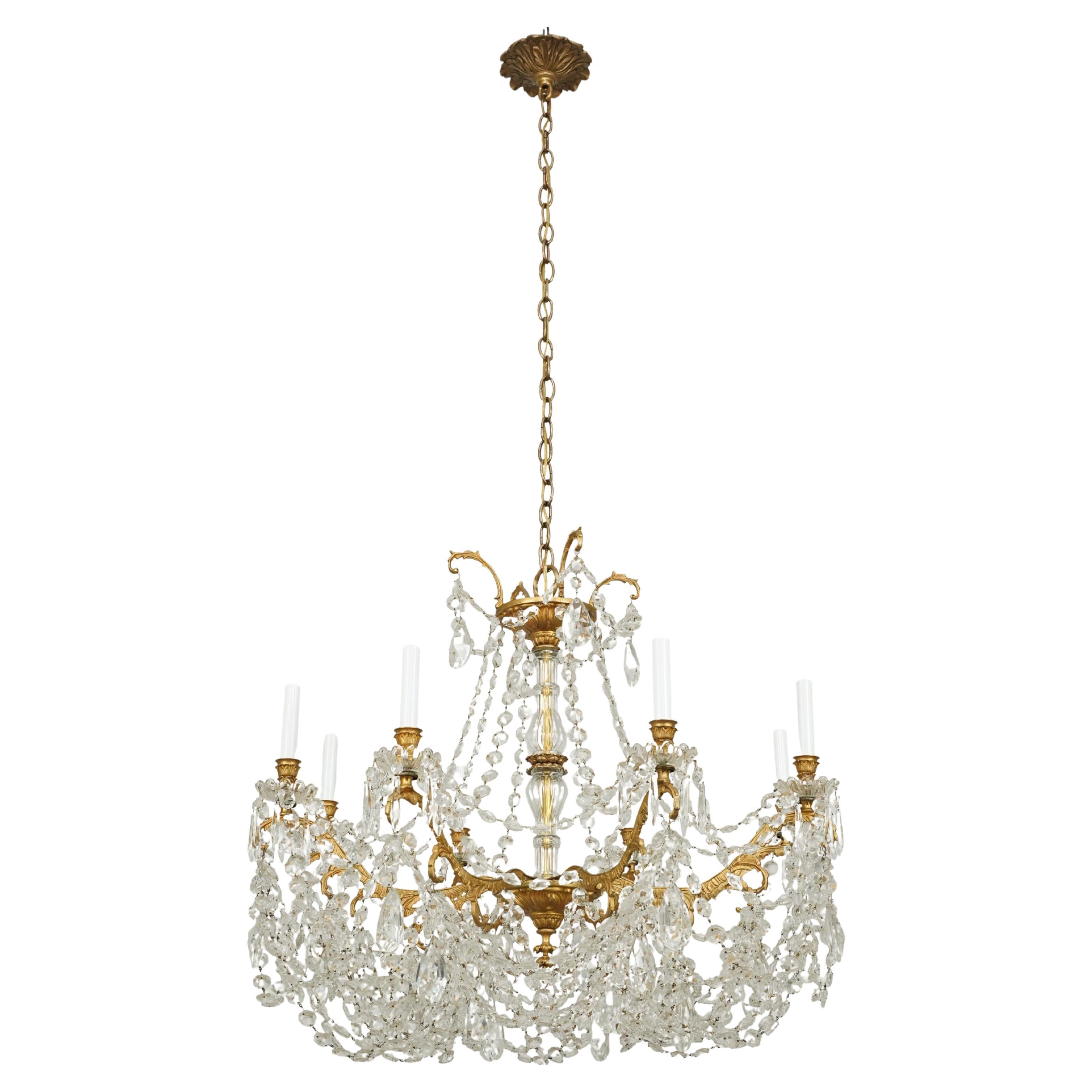 Waldorf Astoria 8 Arm Crystal Beaded & Brass Chandelier For Sale