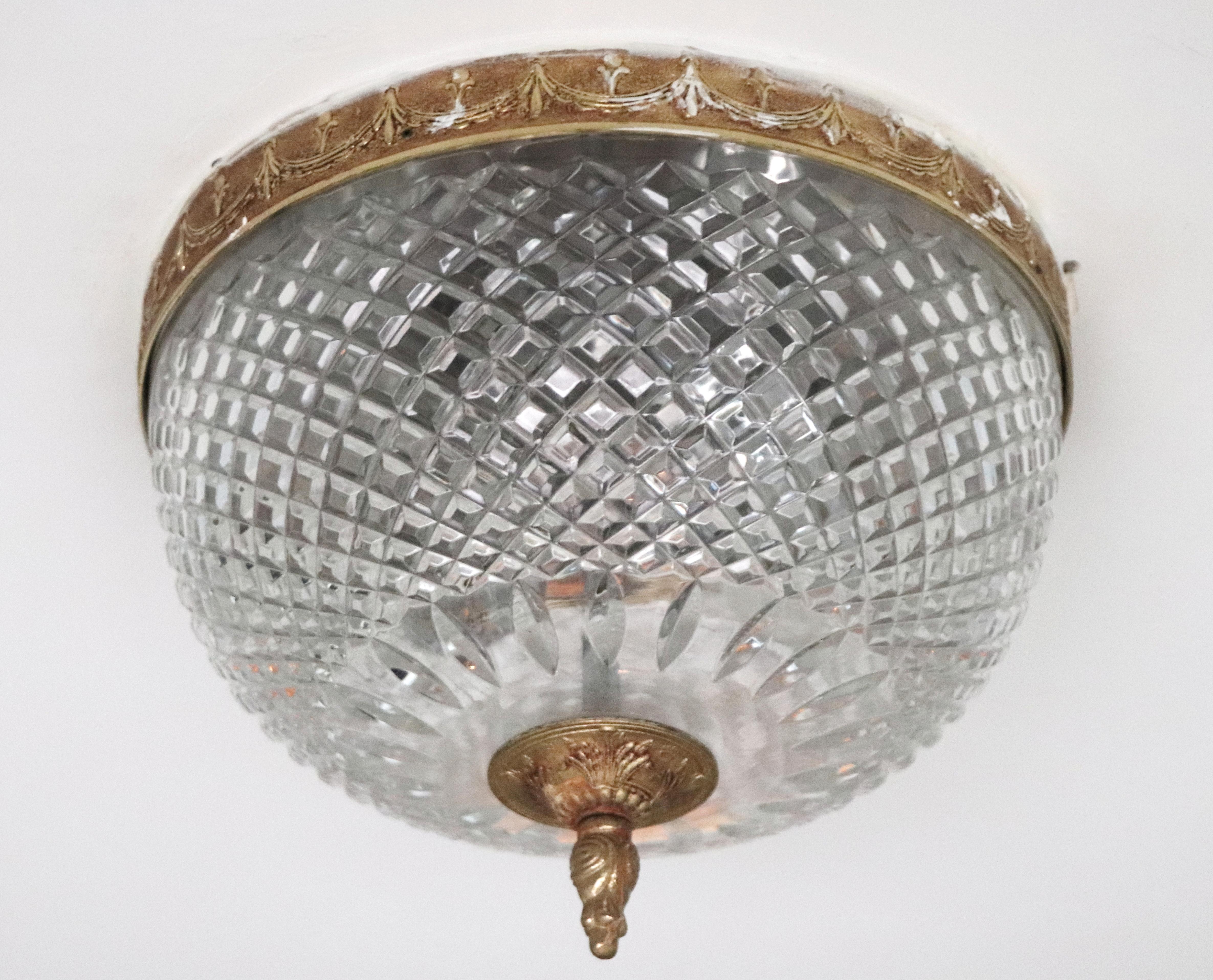20th Century Italian style flush mount light with Slovakian cut crystal globe shade and matching brass rim and bottom finial. Reclaimed from the NYC Waldorf Astoria Hotel Towers on Park Ave. Waldorf Astoria authenticity card included with your