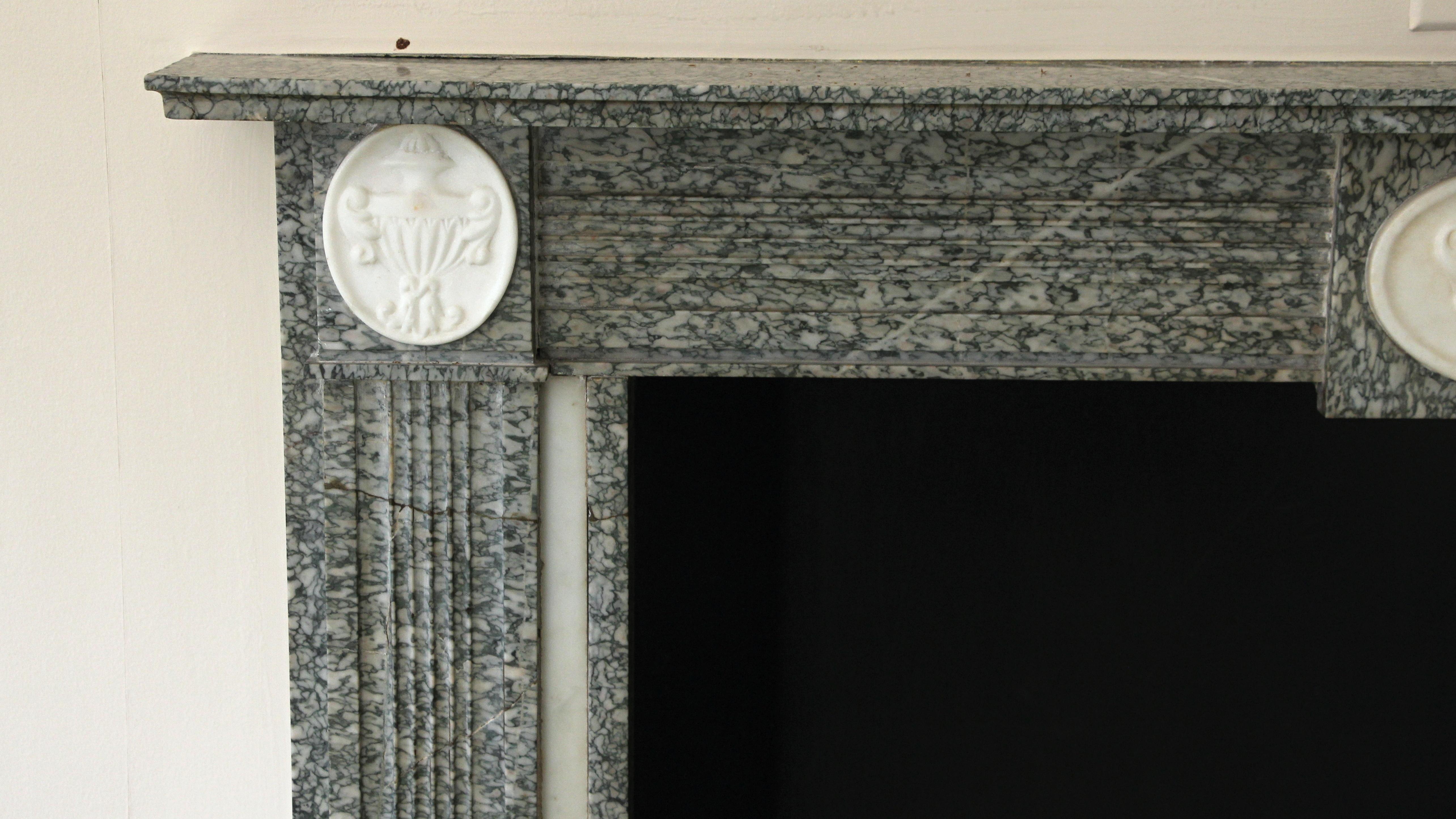Waldorf Astoria Hotel Gray Marble Mantel with Urn Detail In Good Condition For Sale In New York, NY