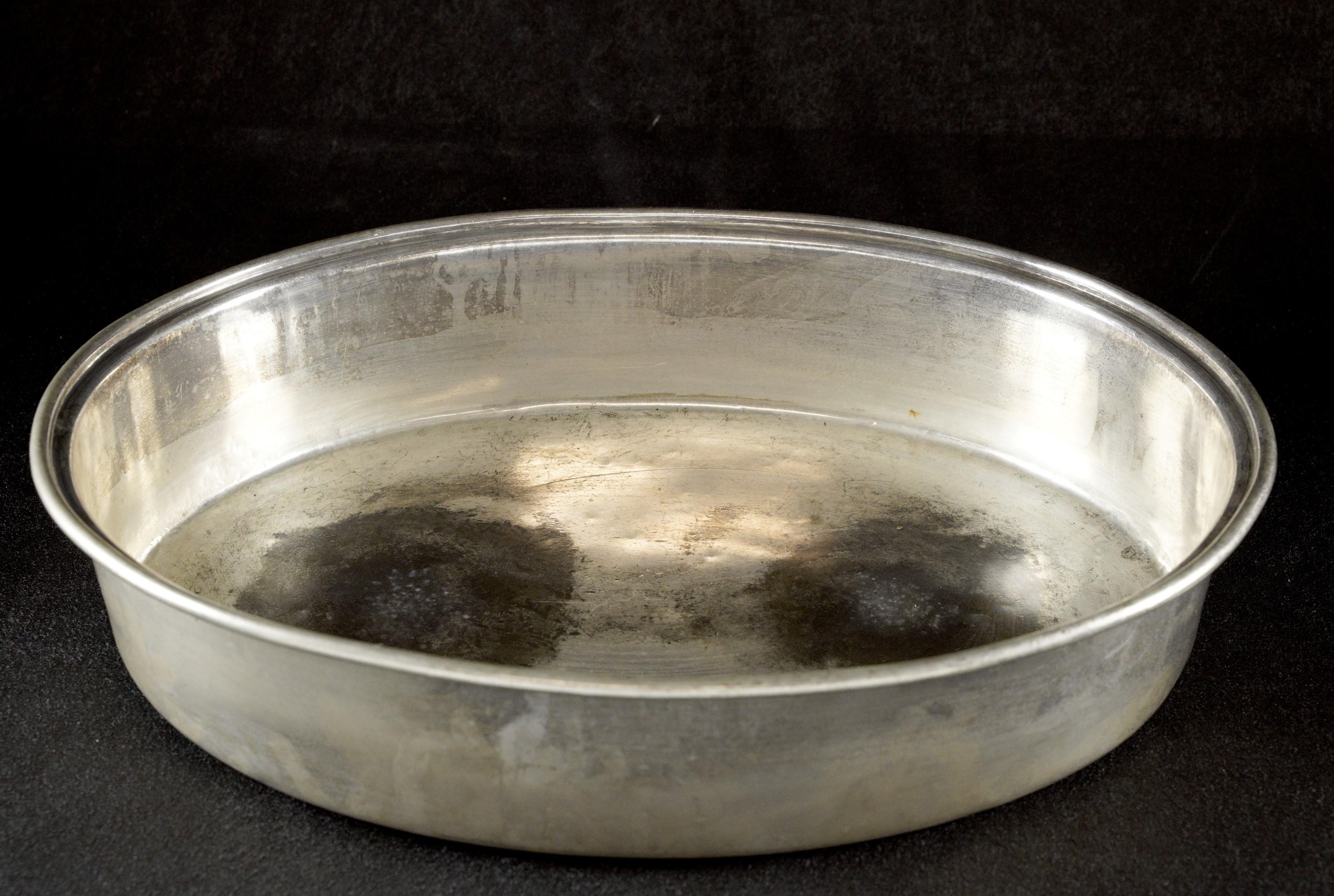 Well used silver plated brass buffet bowl rescued from the one and only Waldorf Astoria Hotel on Park Ave in New York City. This oval heavy gage has a few minor dents on the base and rim from much use and age, along with heat stains from heat from