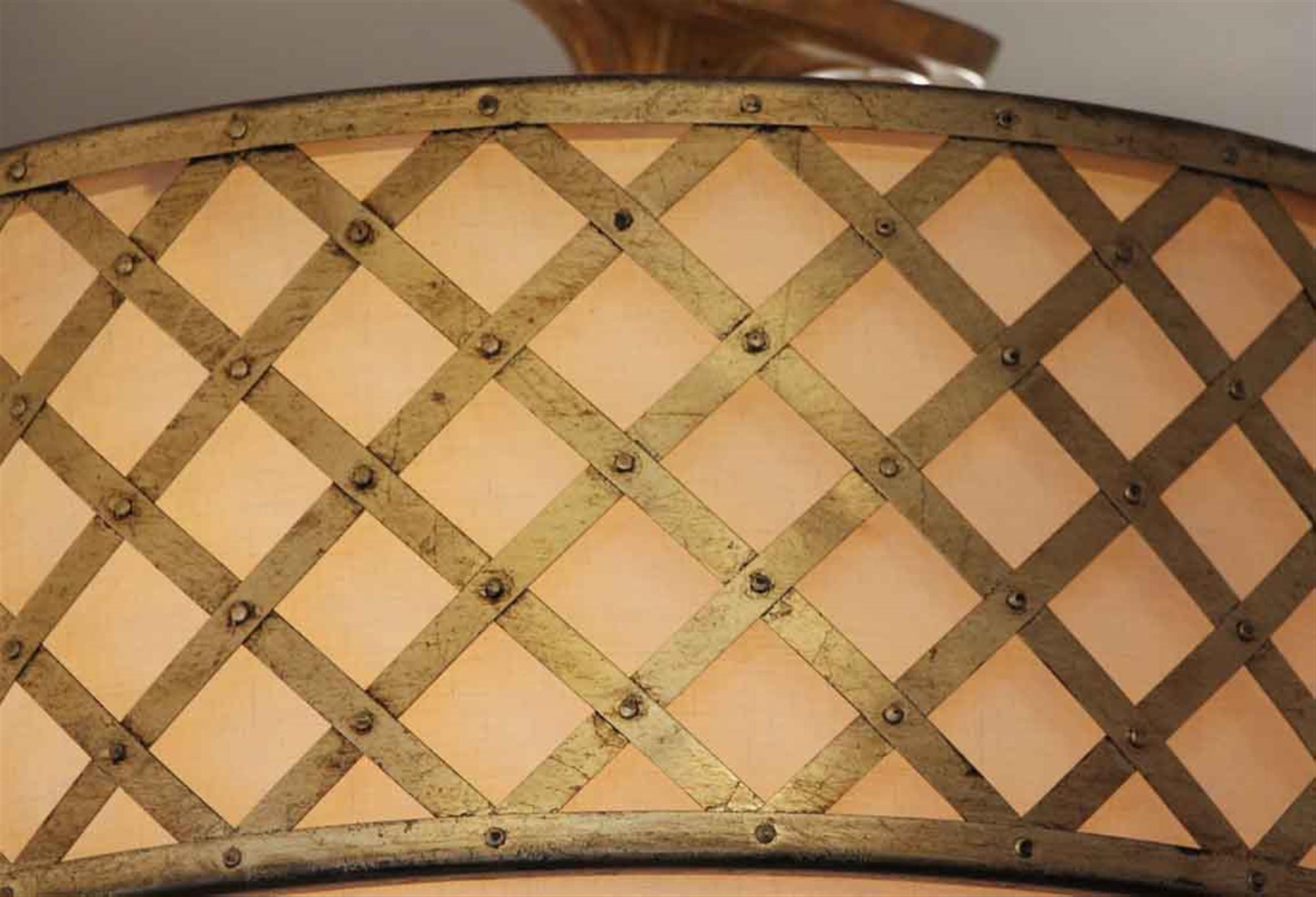 Brass lattice design hanging light with silk shade. This light was once in the Elizabeth Taylor Suite in the Waldorf Astoria Hotel after the hotel underwent renovation in the 1980s. Price includes wiring and cleaning. Please allow 1-2 weeks to