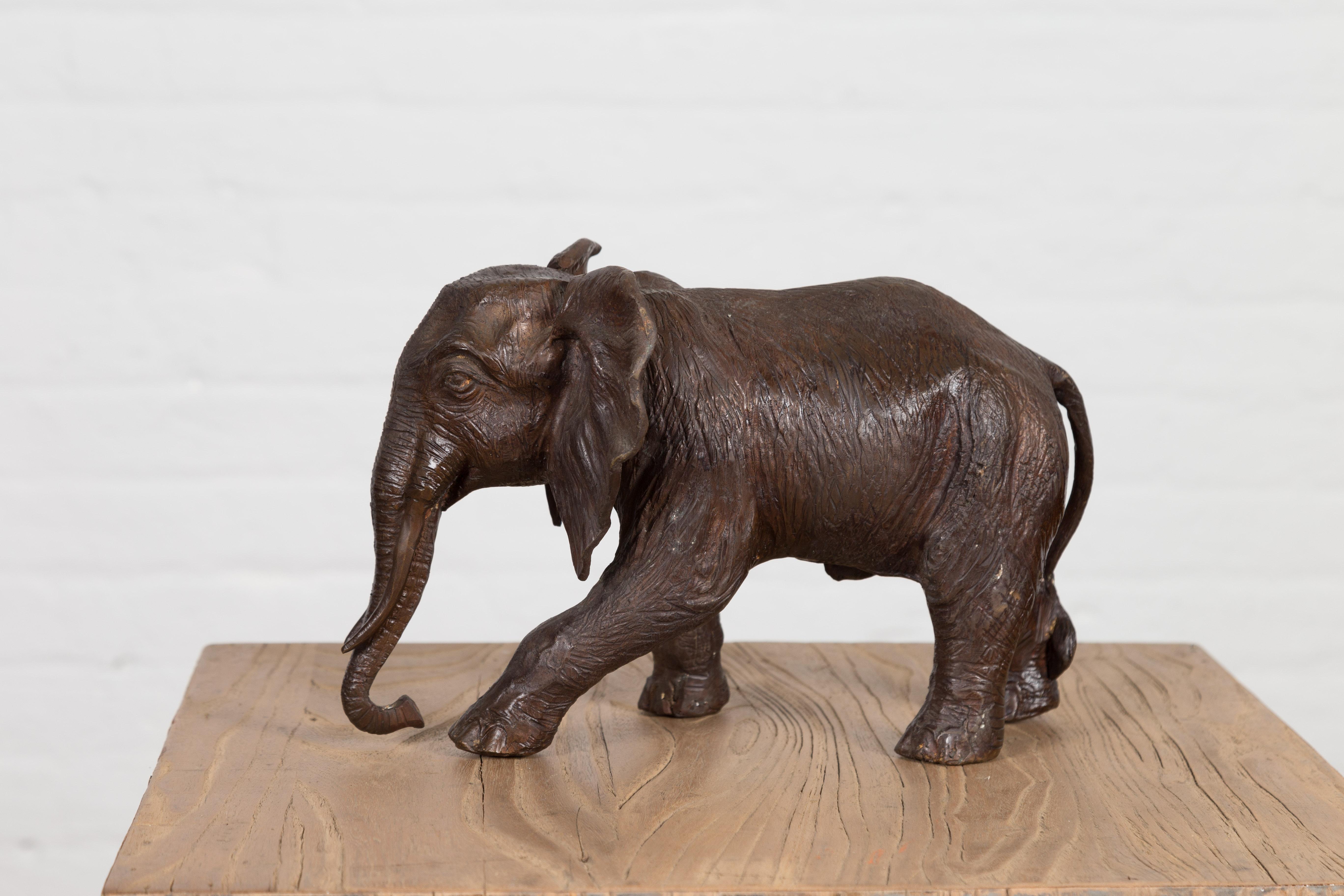 Walking Baby Elephant Lost Wax Cast Bronze Tabletop Sculpture with Dark Patina For Sale 1