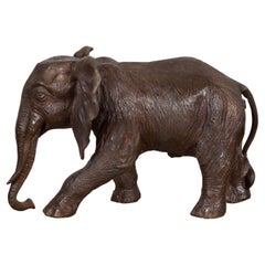 Walking Baby Elephant Lost Wax Cast Bronze Tabletop Sculpture with Dark Patina