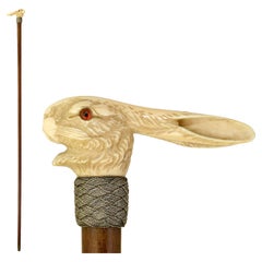 Walking cane with carved hare