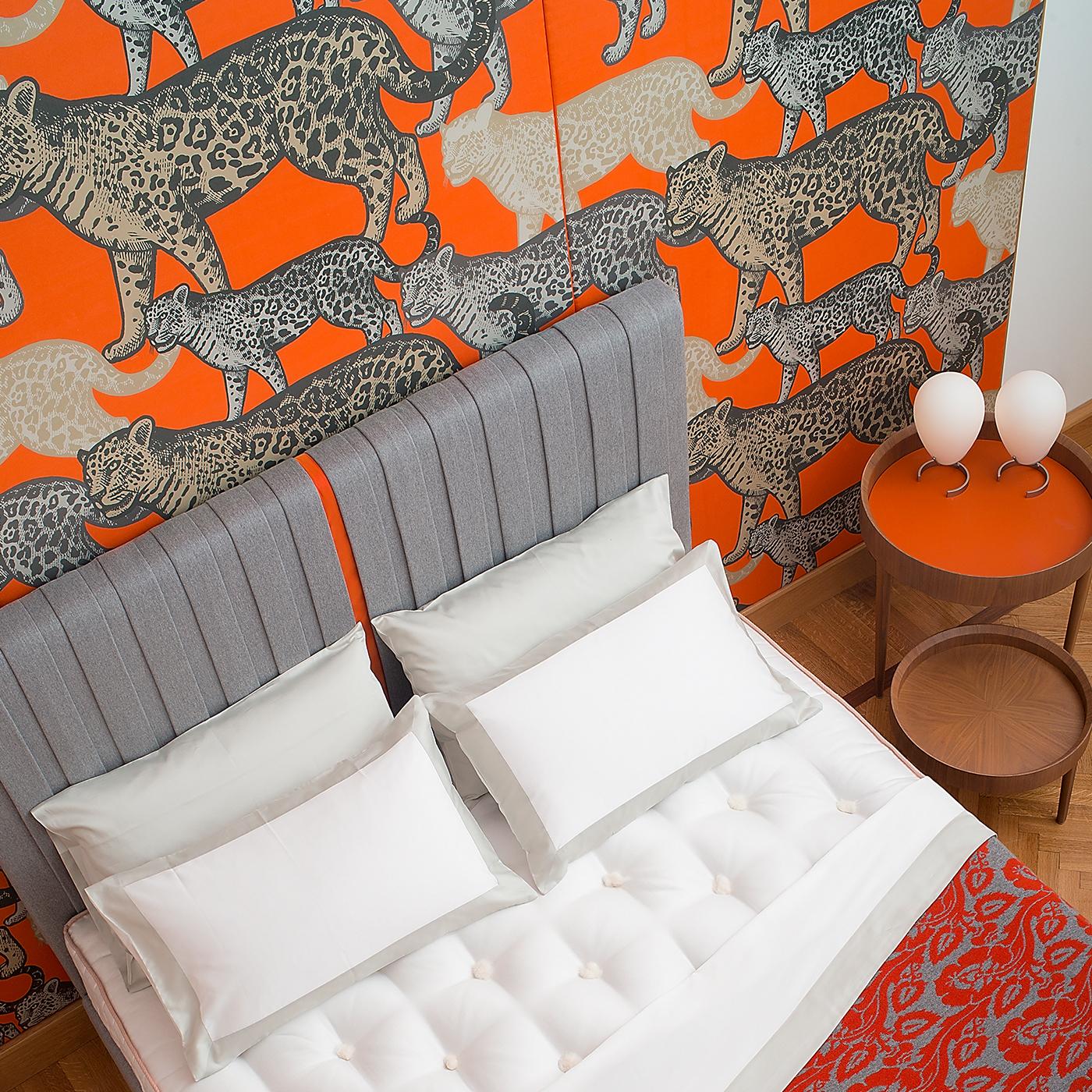 This stunning wall covering is part of the Walking Leopards Collection in five different versions, distinctive for their bold color palette and eclectic design. A mesmerizing and visually impactful decoration for a modern home, this piece was