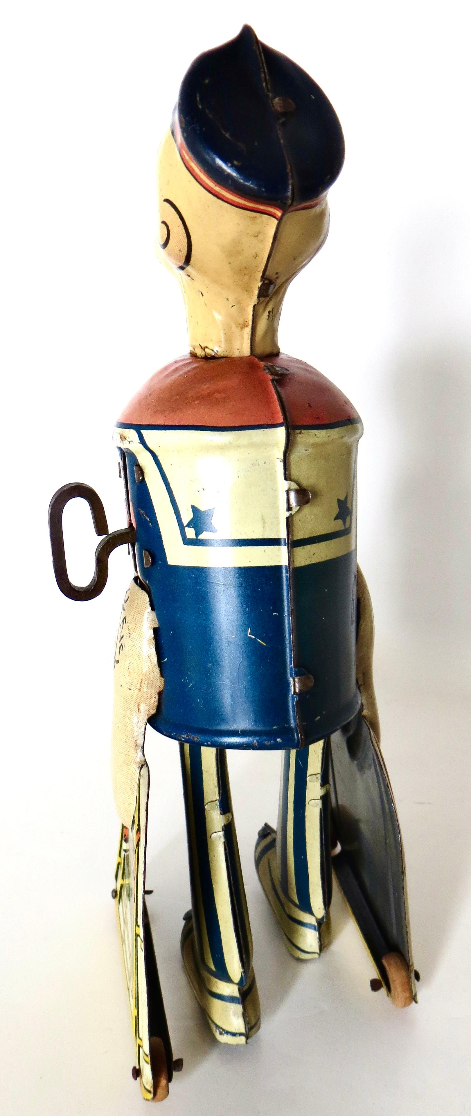 „Walking Popeye“ mit Papageien Vintage Windup-Spielzeug von Marx Toy Co. (Metallarbeit) im Angebot