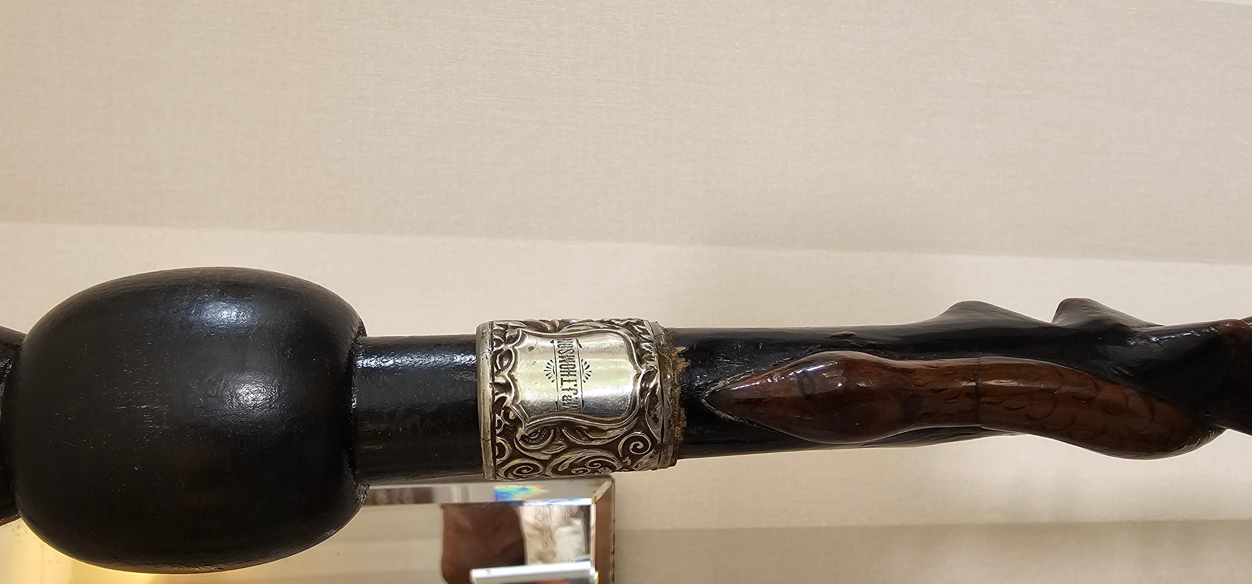 This is a very fine example of a late 19th century Briar wood walking stick from an Edinburgh workshop in Scotland . 
More used as an object of status than a walking stick but exceptional carving and quality of wood. 
Carved for a ' Mr J Thomson'