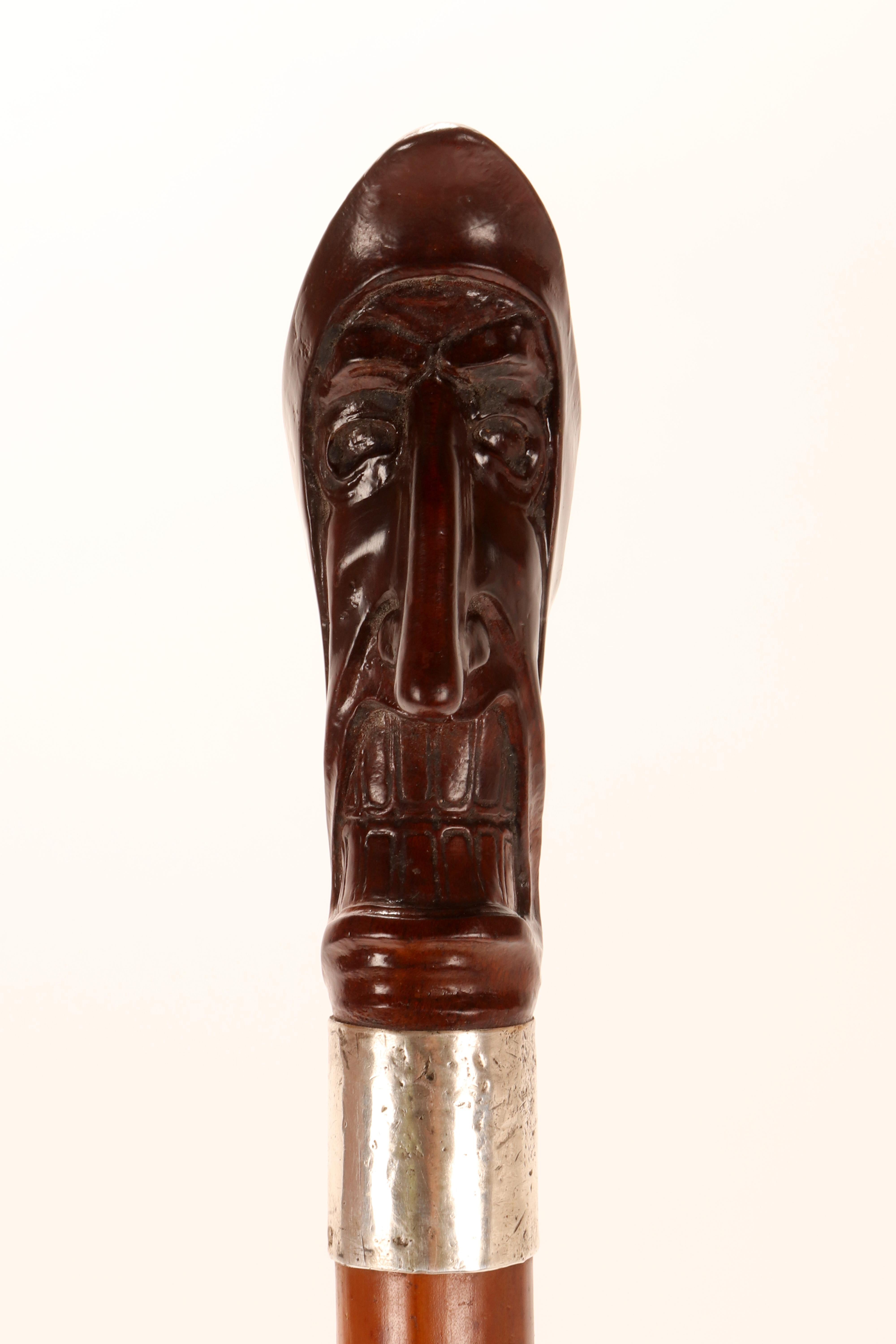 Silver Walking stick, the caricatured face of a man, by Delavilla, Austria 1915. For Sale