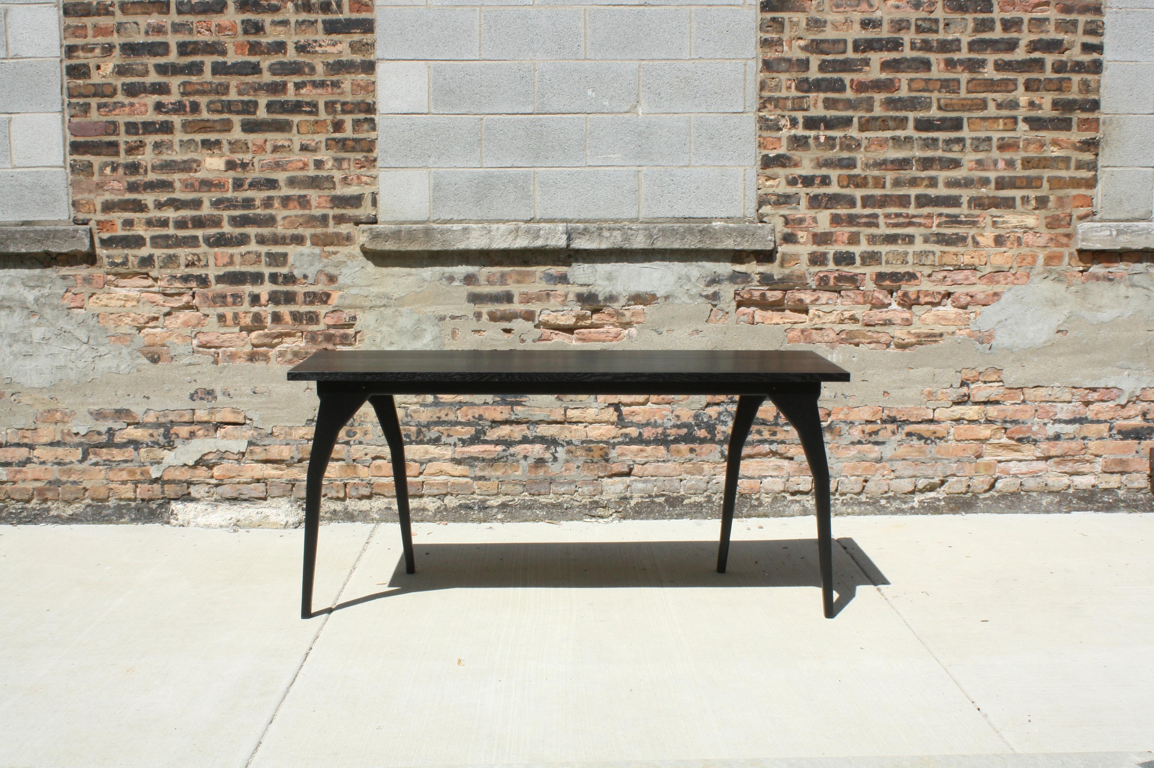 Shown in ebonized quarter-sawn white oak, oxidized walnut, and oxidized maple

Measures: 66-72