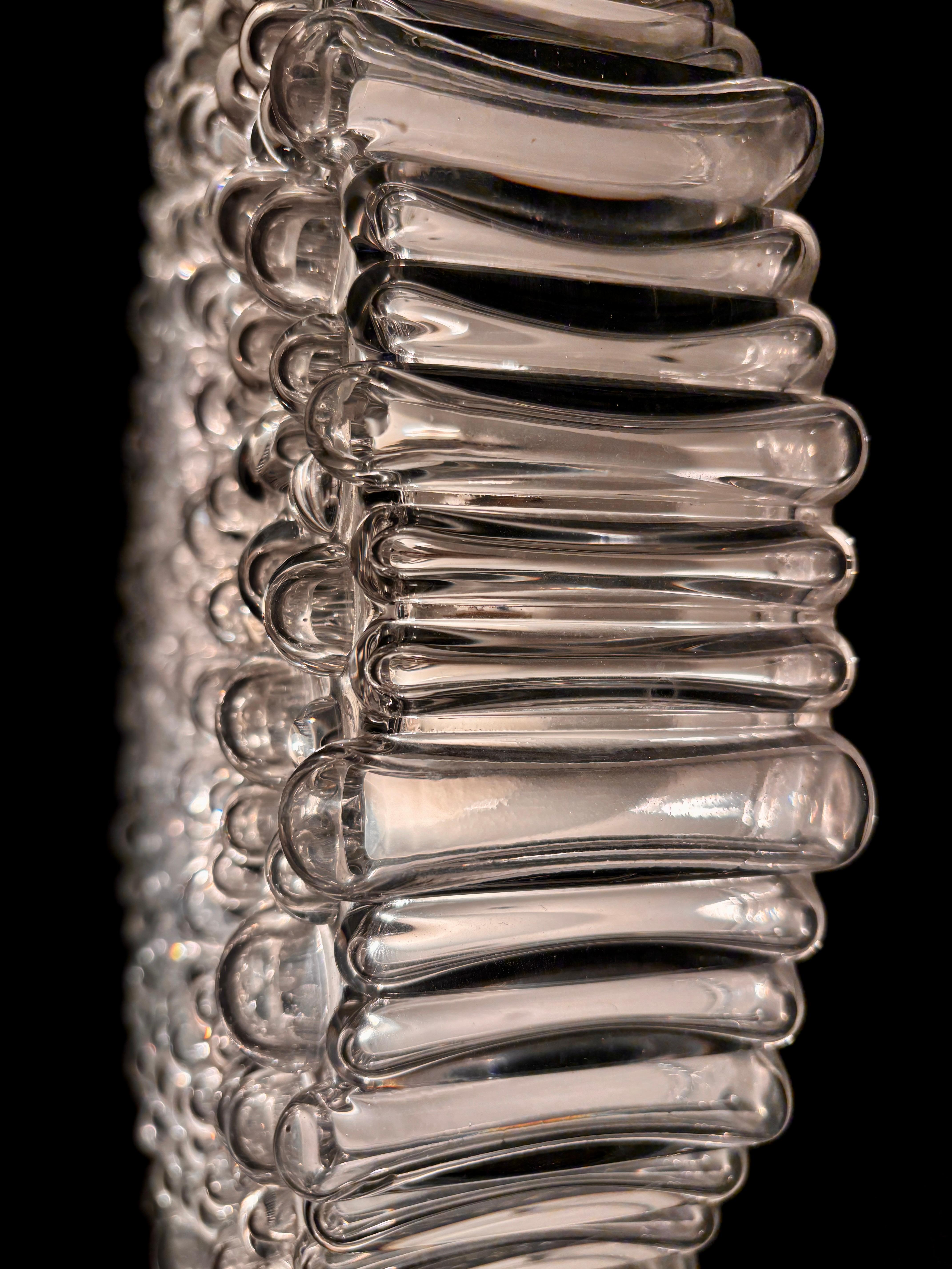 Very beautiful, large, and heavy wall and ceiling light by Helena Tynell for Glashütte Limburg, 1970s.
The design was created by Scandinavian designer Helena Tynell.
Beautiful lighting effect thanks to the air bubbles in the glass and the thick