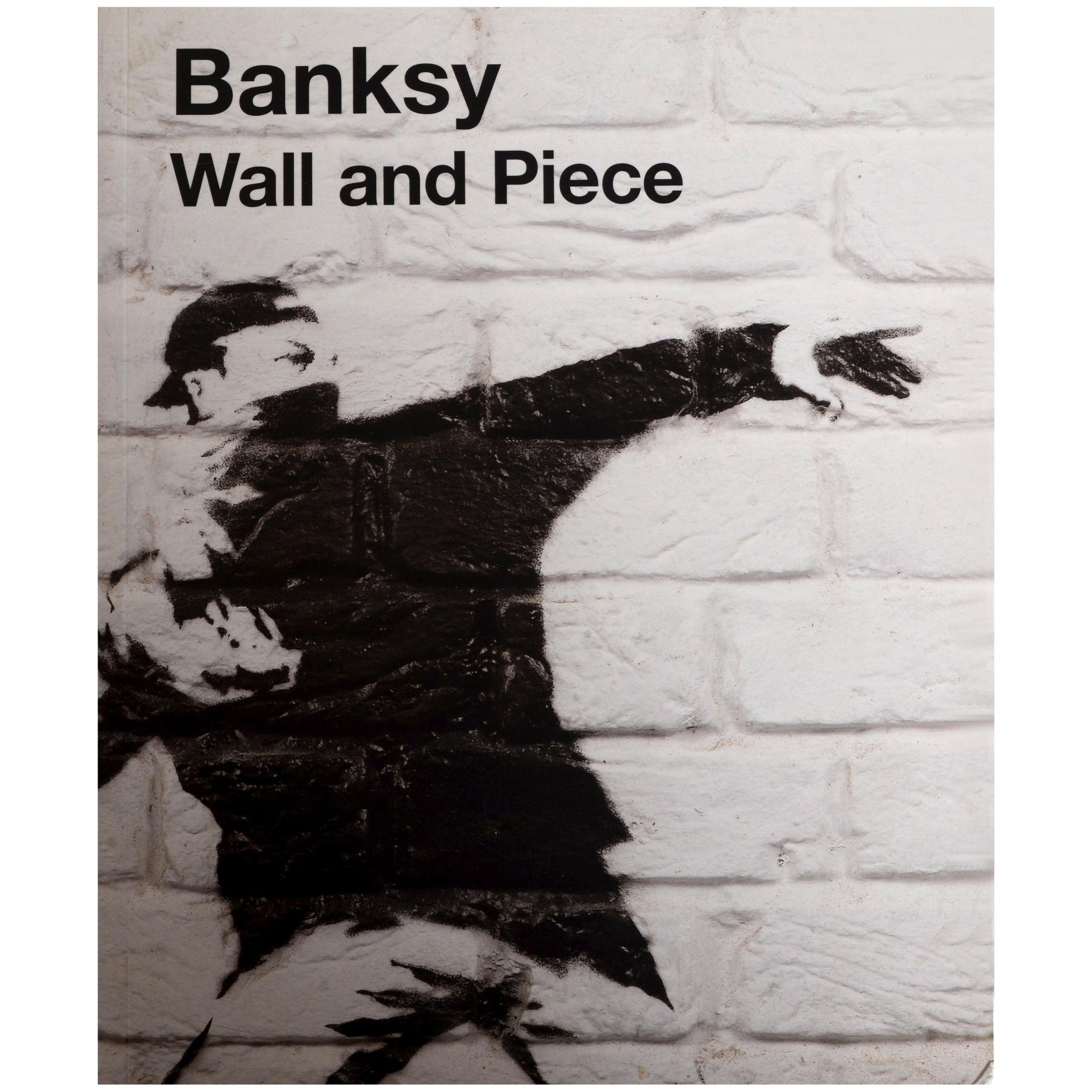 Wall and Piece by Banksy