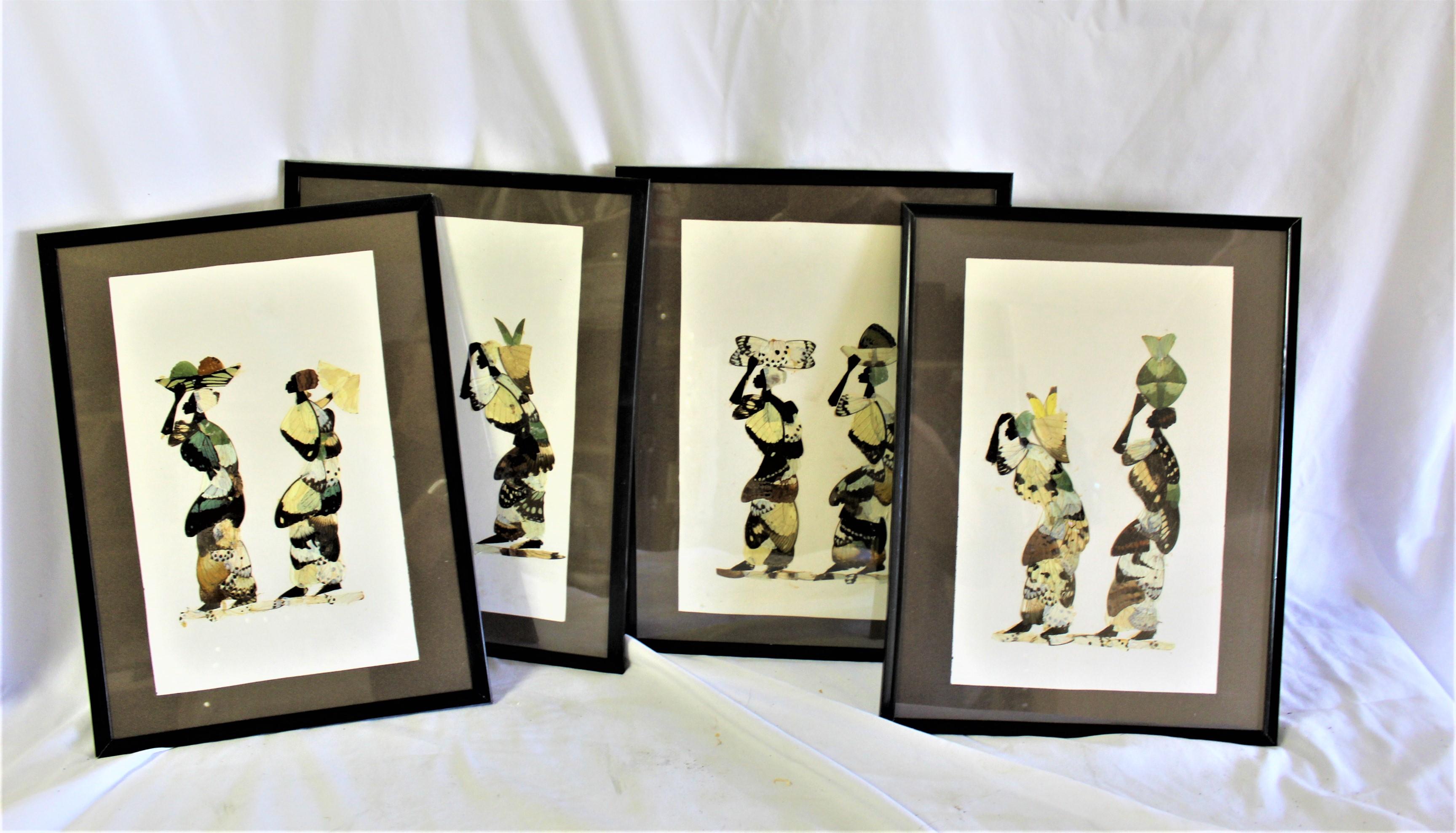 A set of hand made art work made of all Butterfly wings. Framed in black frames . Frames are 12