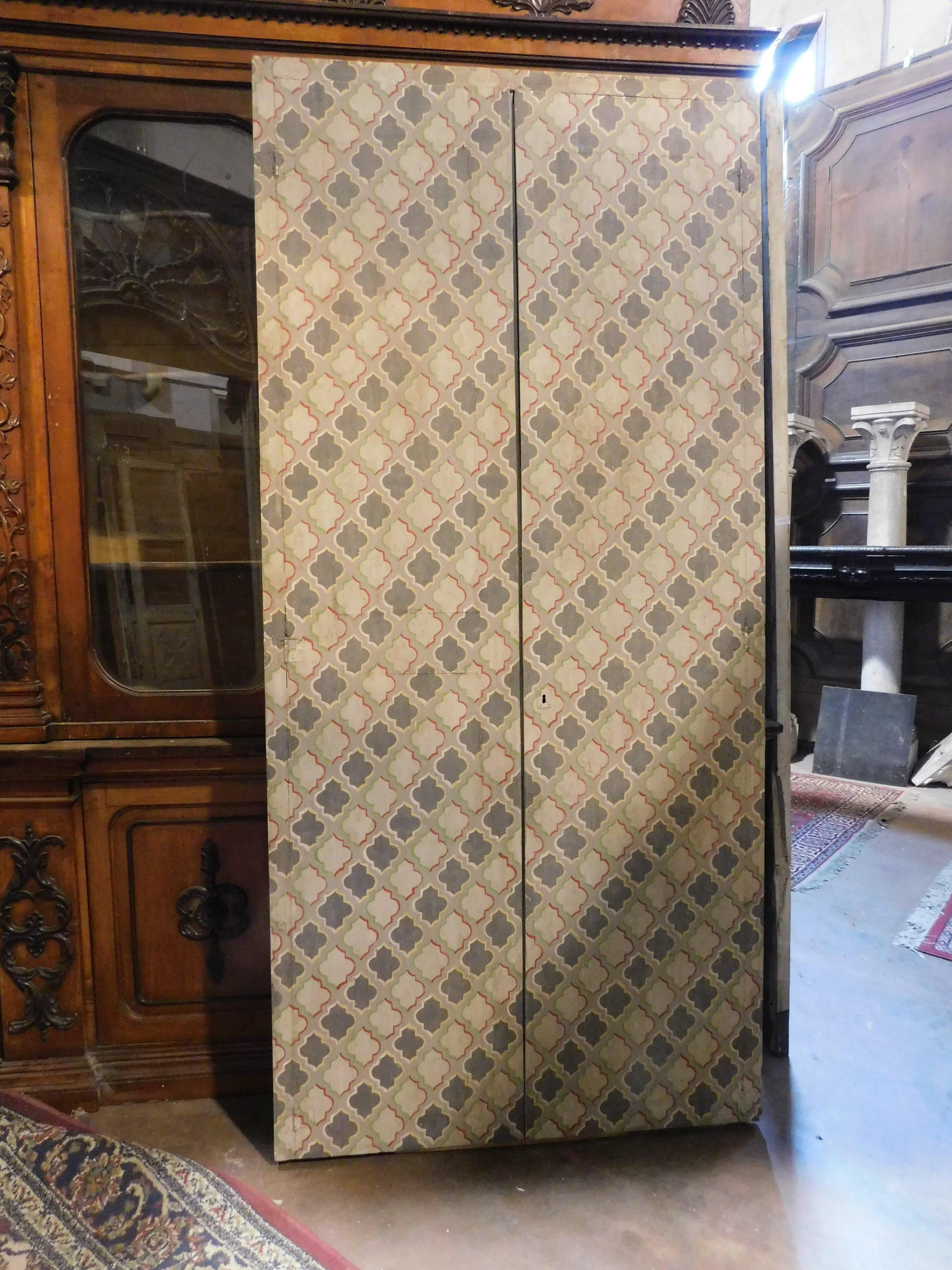 Hand-Painted wall cabinet, double wing placard painted with geometric decorations, Italy