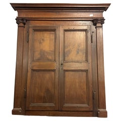 Wall cabinet, placard, in walnut with two doors, Italy