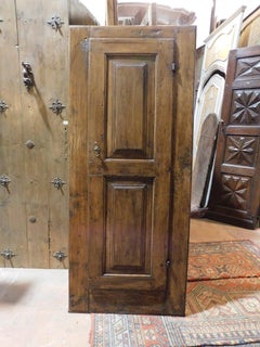 wall cabinet, single-door placard carved in walnut, Italy