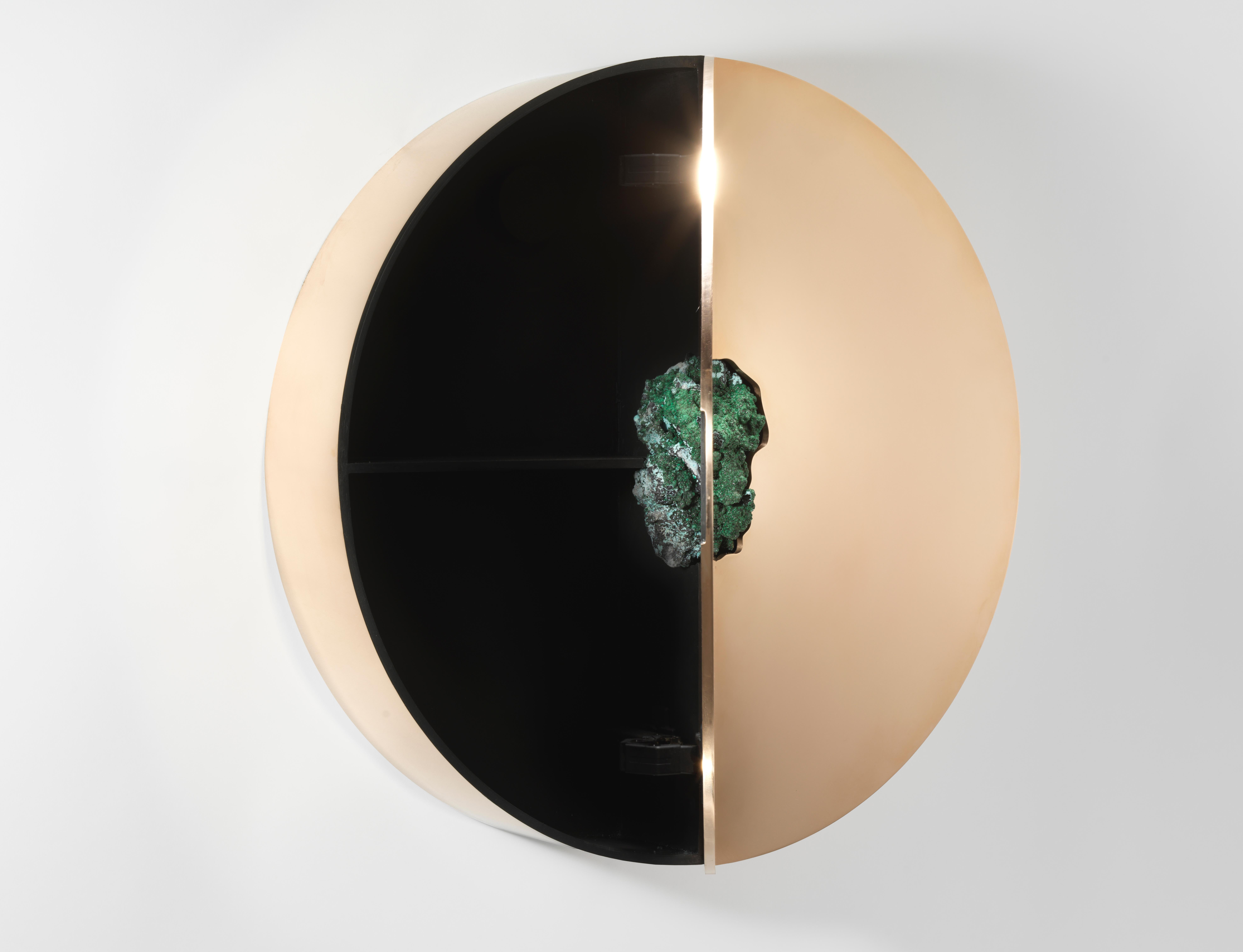 Wall cabinet with Malachite by Pierre De Valck.
Dimensions: W 56 x D 15 x H 56 cm.
Materials: Polished bronze with Malachite.
Weight: 20 kg.
Each piece is unique.

Pierre De Valck (1991) born in Brussels, is a Ghent-based designer with a