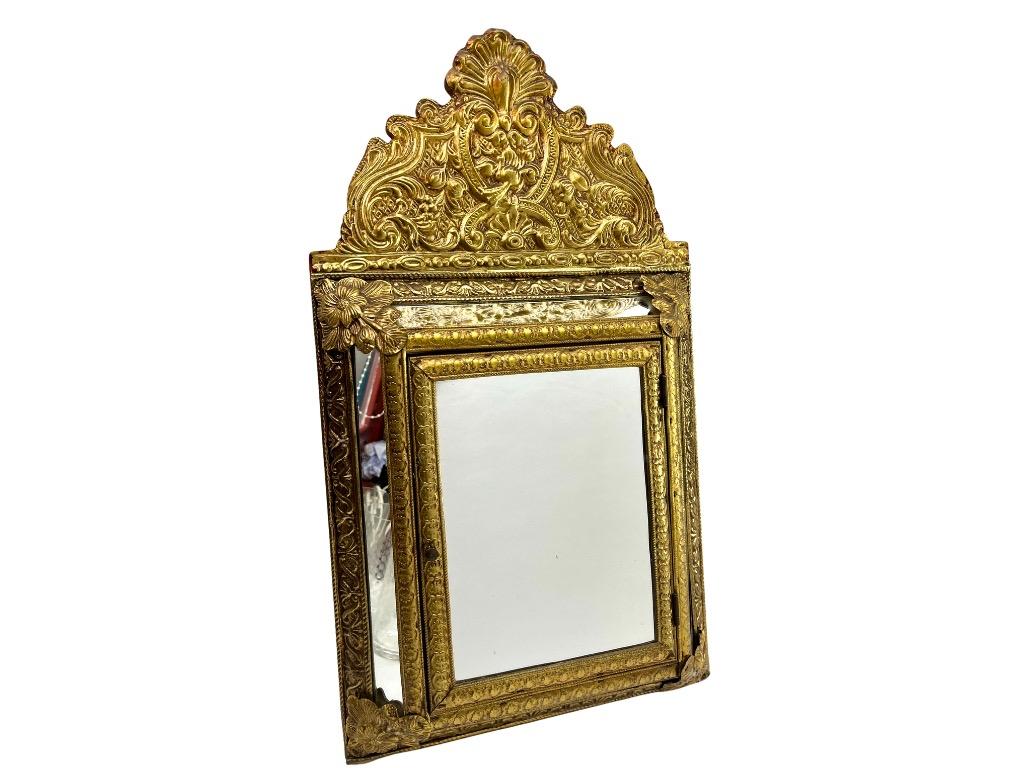 Wall Cabinet with Mirror and Repousese Brass finishing.
Useful for the hall as a key cabinet

Please don't hesitate to get in touch with any further questions.  

With Best Wishes 
Geert Niessen