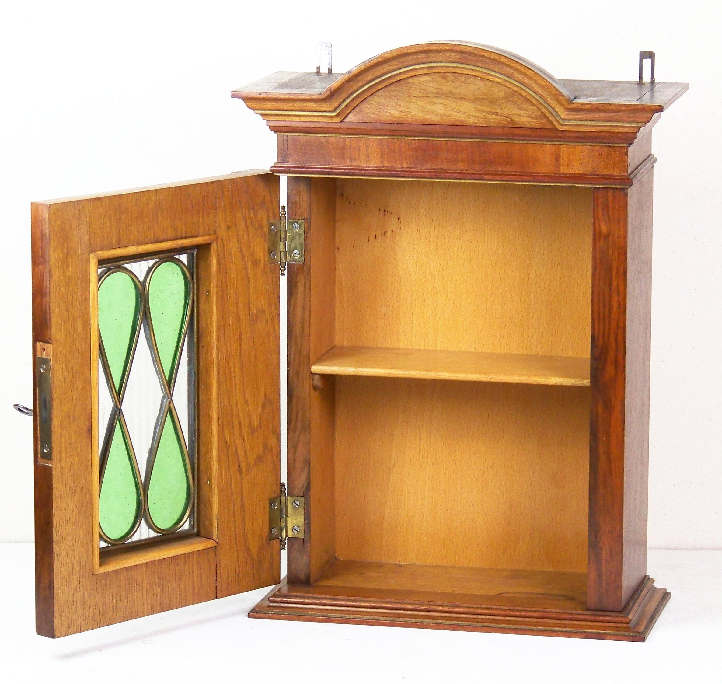 vintage wall cabinet with glass doors