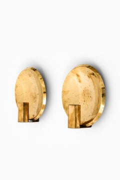 Candeleros de pared en latón, años 60