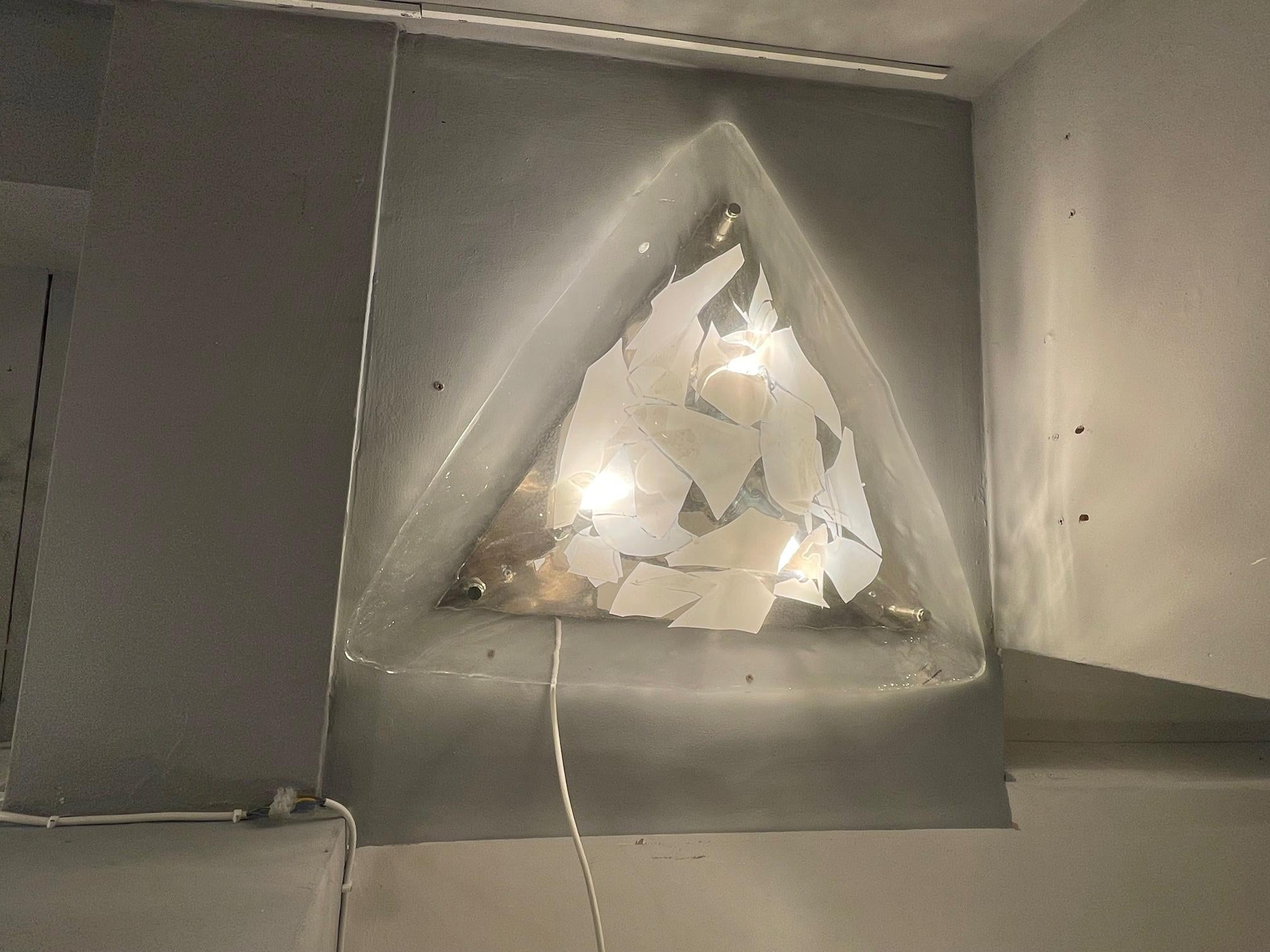 A triangular wall or ceiling lamp in clear and white Venetian glass.