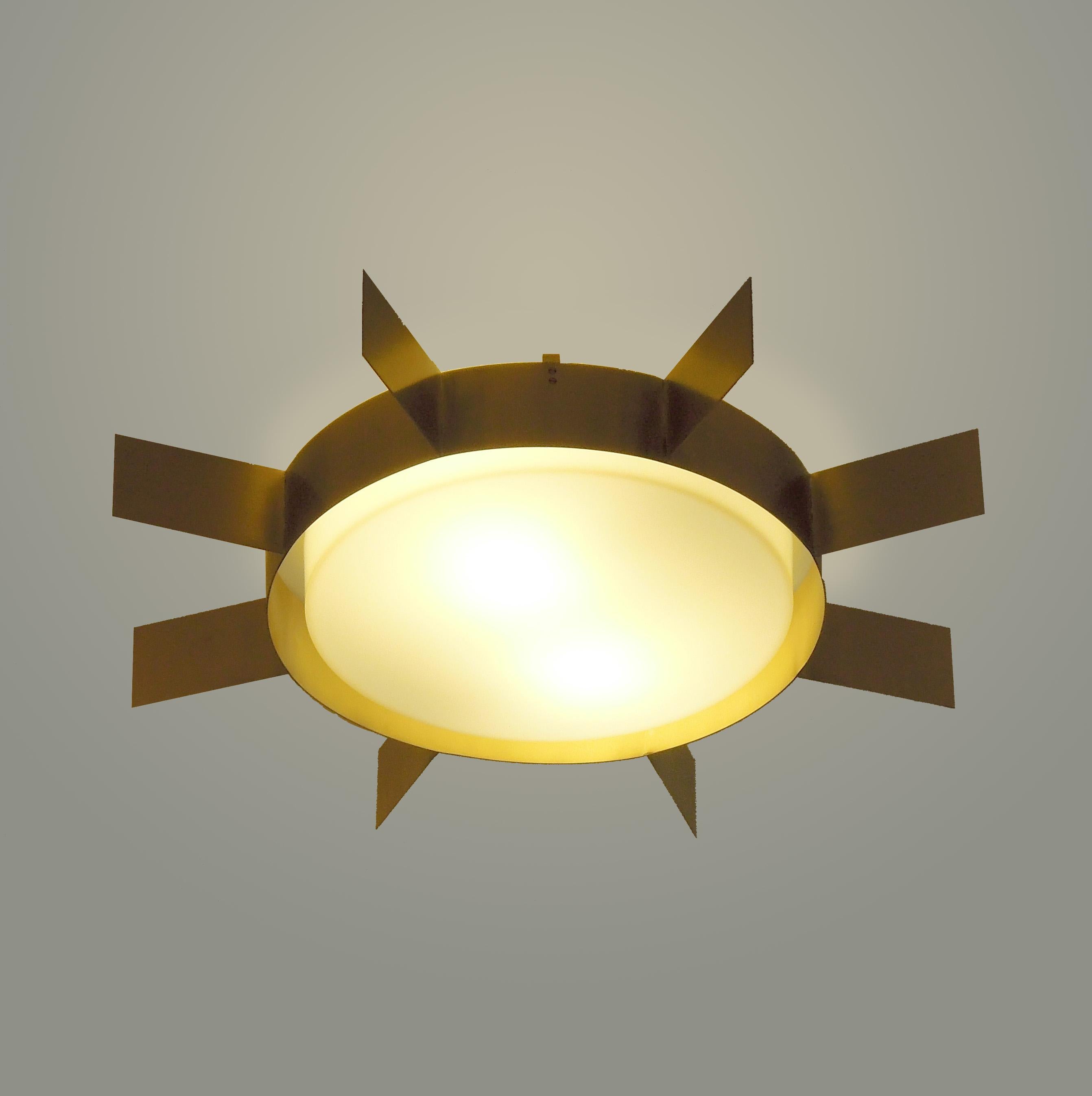 Wall ceiling lamp sun, collection of 'Screen of Light' design by Gio Ponti Italy, in satined brass with a round opaline glass. 

Wall and ceiling sculpture light in satined brass, a lamp of timeless, iconic design. Handcrafted product, realised by