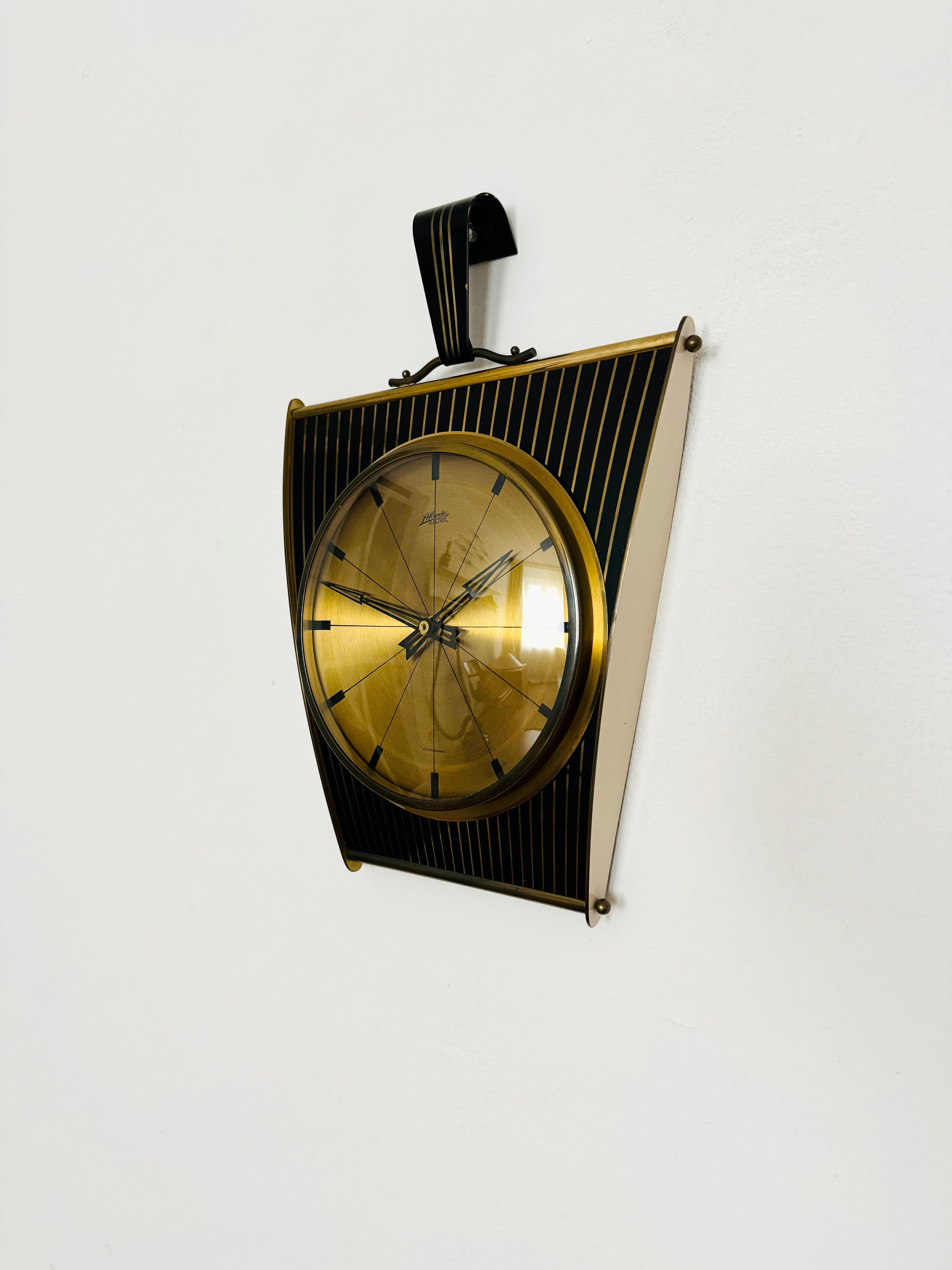 Metallo Orologio da parete di Atlanta Electric in vendita