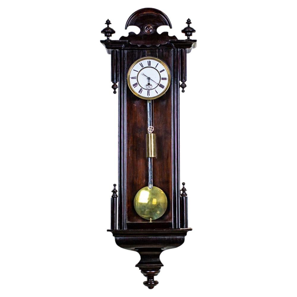 Wall Clock from the Late 19th Century in Black Glazed Wooden Case For Sale