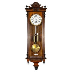 Wall Clock from the Late 19th Century in Walnut Case