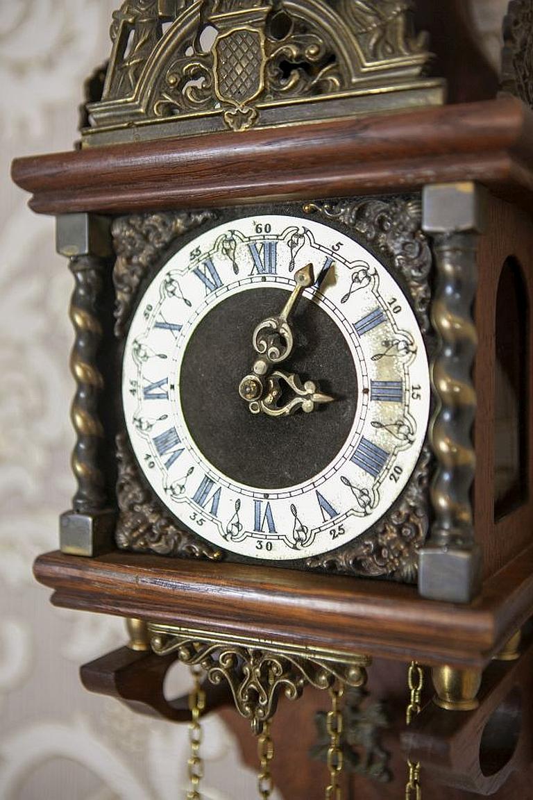 black and oak wall clock
