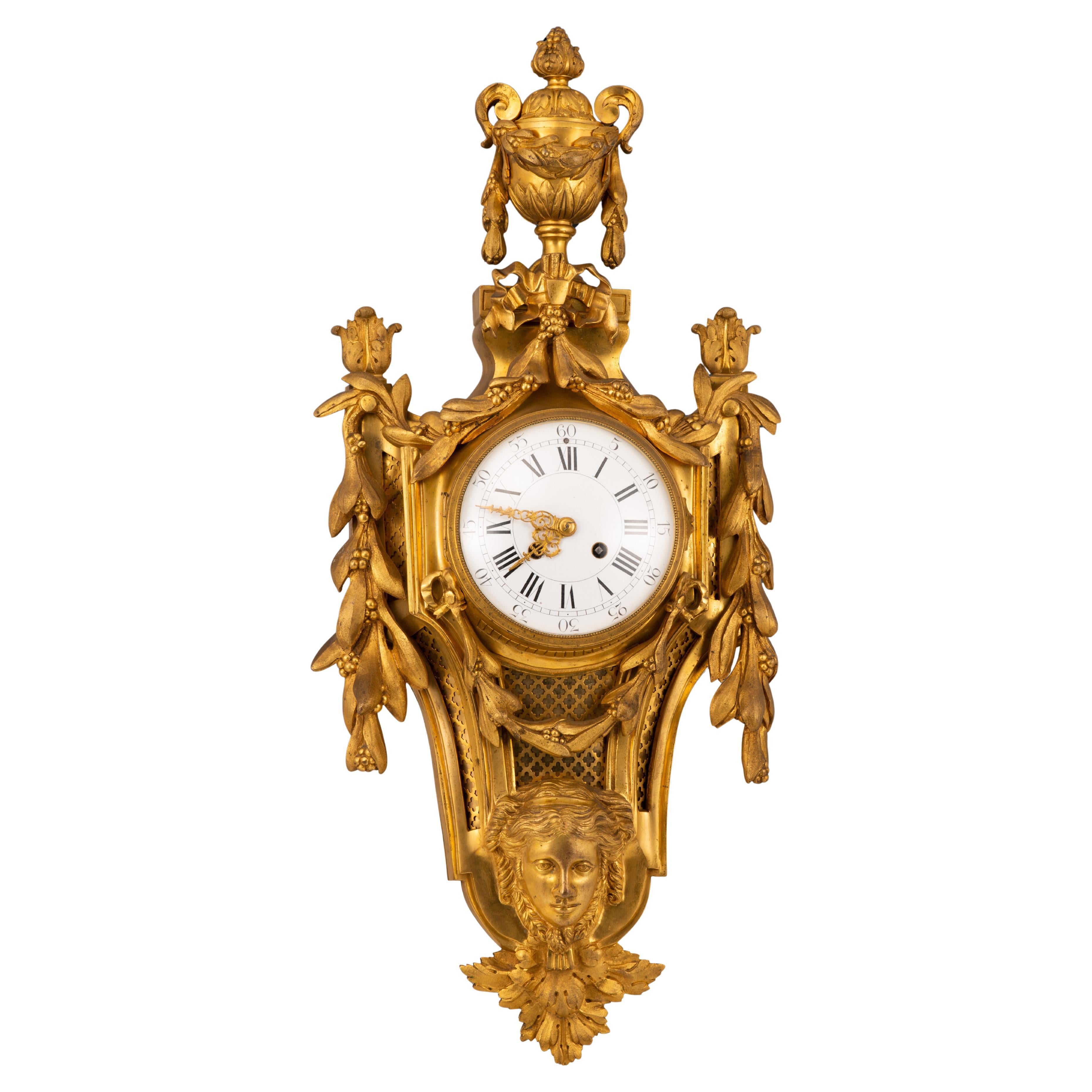 Wall clock. Gilt bronze. France, 19th century.