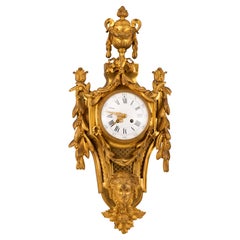 Orologio da parete. Bronzo dorato. Francia, XIX secolo.