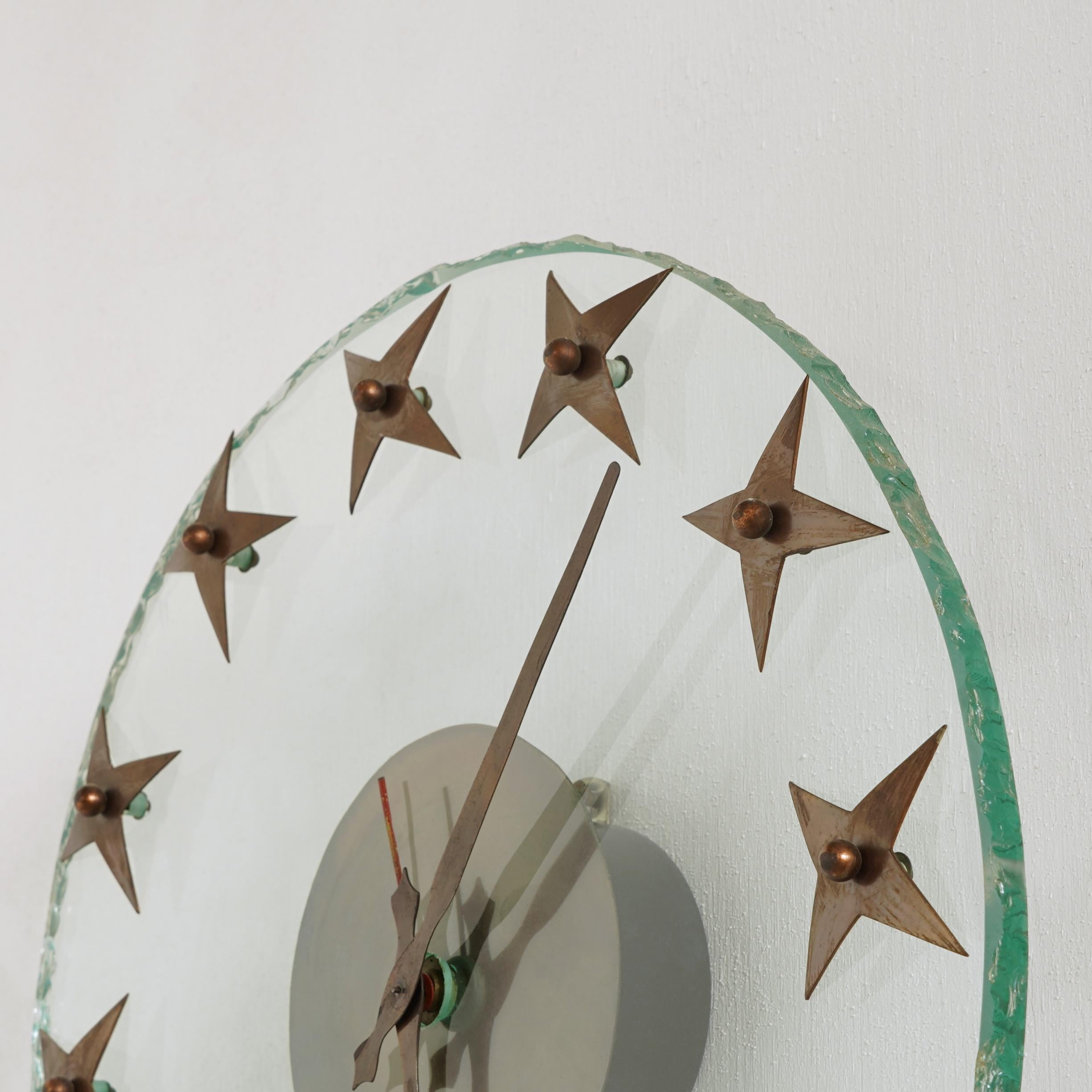Mid-Century Modern Art Deco Wall Clock in Rough Edged Glass with Brass Stars 1940s For Sale