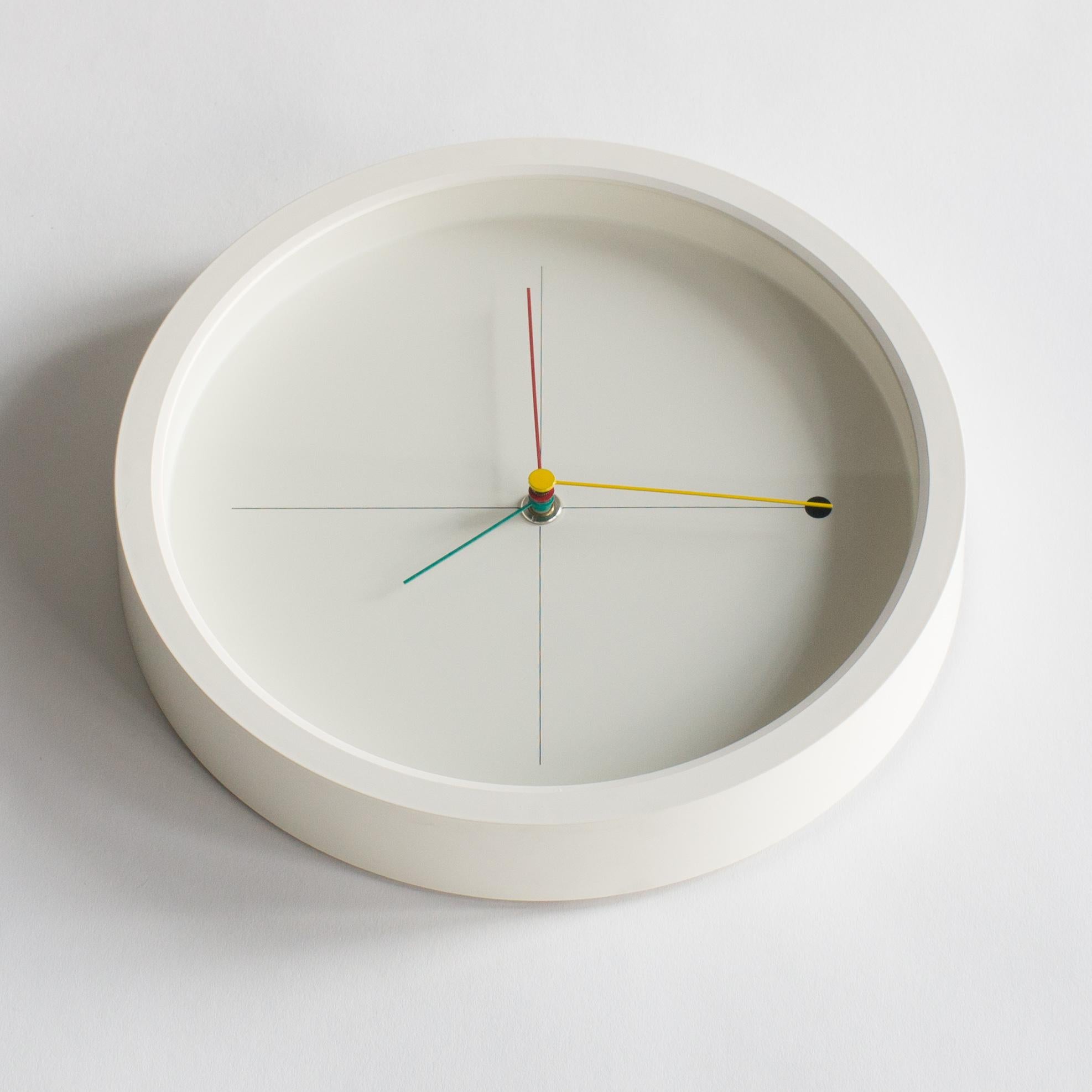 Wall clock by Wakita hi-tecs, Japan. Wakita hi-tecs produced a lot of small pieces in the 1980s-1990s under the name of superpresent. Especially Shohei Mihara's clock series are famous.
   