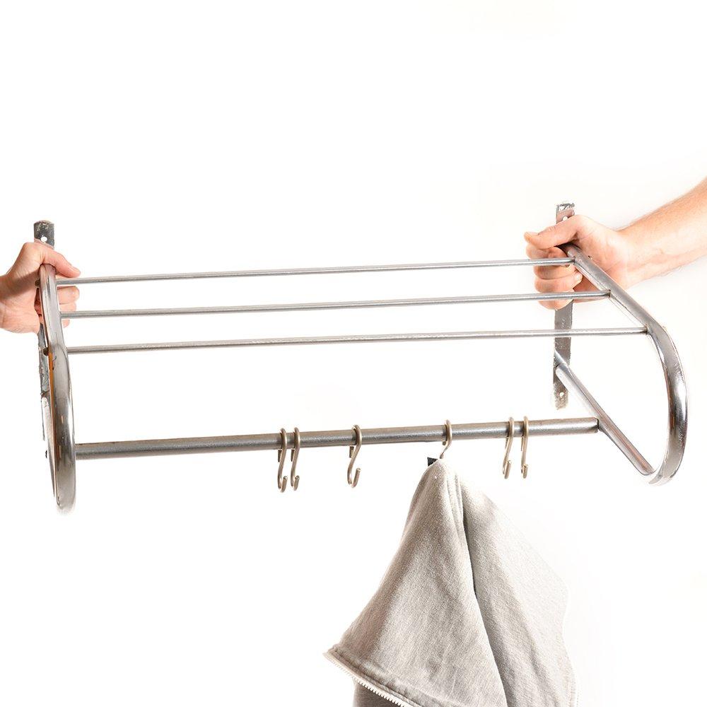 Beautiful vintage item with an industrial design. A beautiful coat rack made of bent chrome pipes. Produced in Czechoslovakia in 1950s. The coat rack has a shelf to place hats on and a rack with original chrome hangers for coats. Very good condition