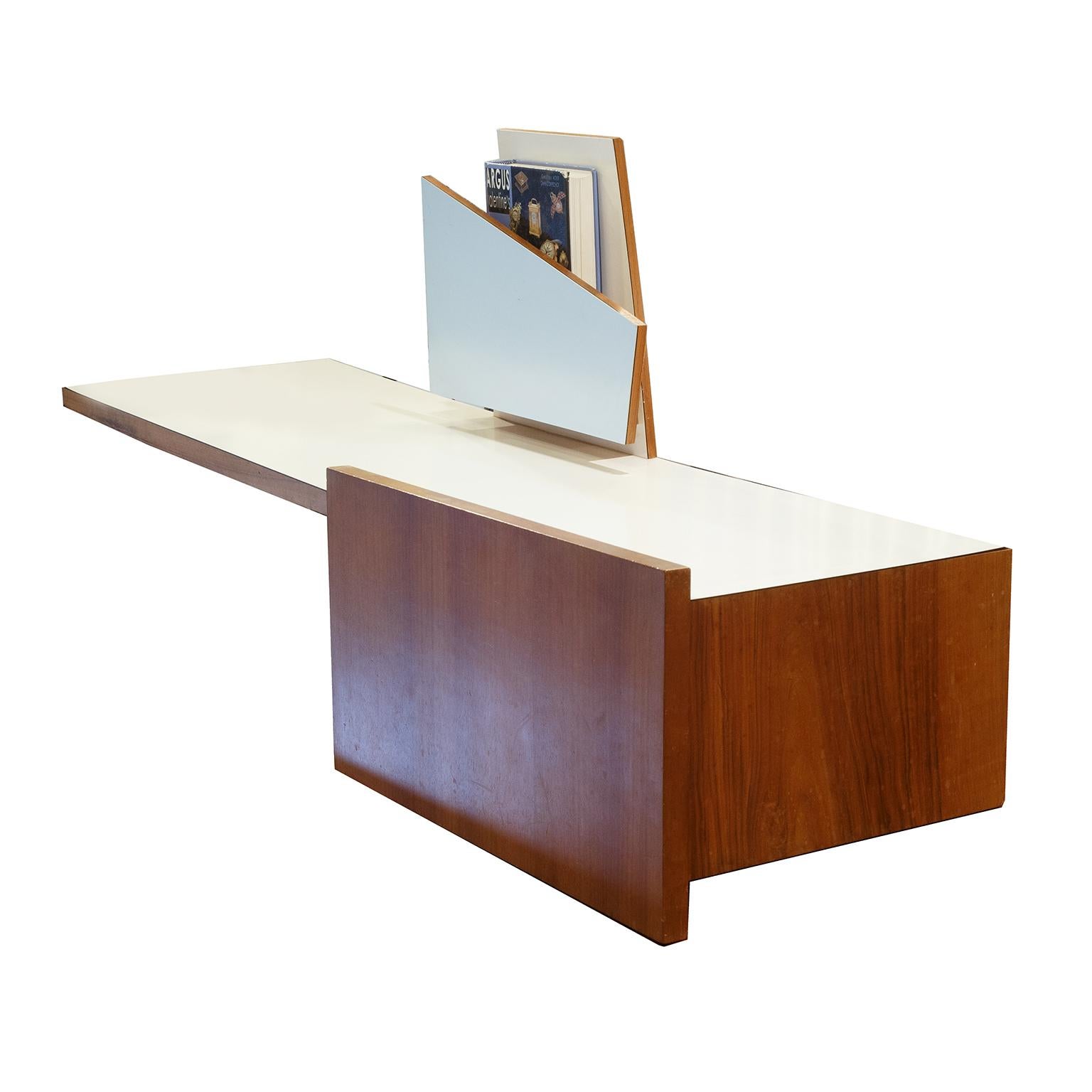 Console suspended on the wall in the style of Gio Ponti Italy Mid-Century Modern 1955 in fruit wood and parts in white and light blue laminate. This console with a touch of exclusive design is suitable for use environments. The console has a flap