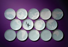 Wall creation 14 porcelain plates with the map of the world. Artist Barford
