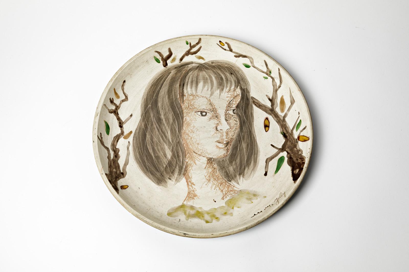 Marie Madelaine Jolly

French unique handmade ceramic piece by Marie Madelaine Jolly

Friend of Jean Cocteau

Large wall decorative ceramic plate

Original good condition

Signed 

Measures: Height 4 cm
Large 32 cm.