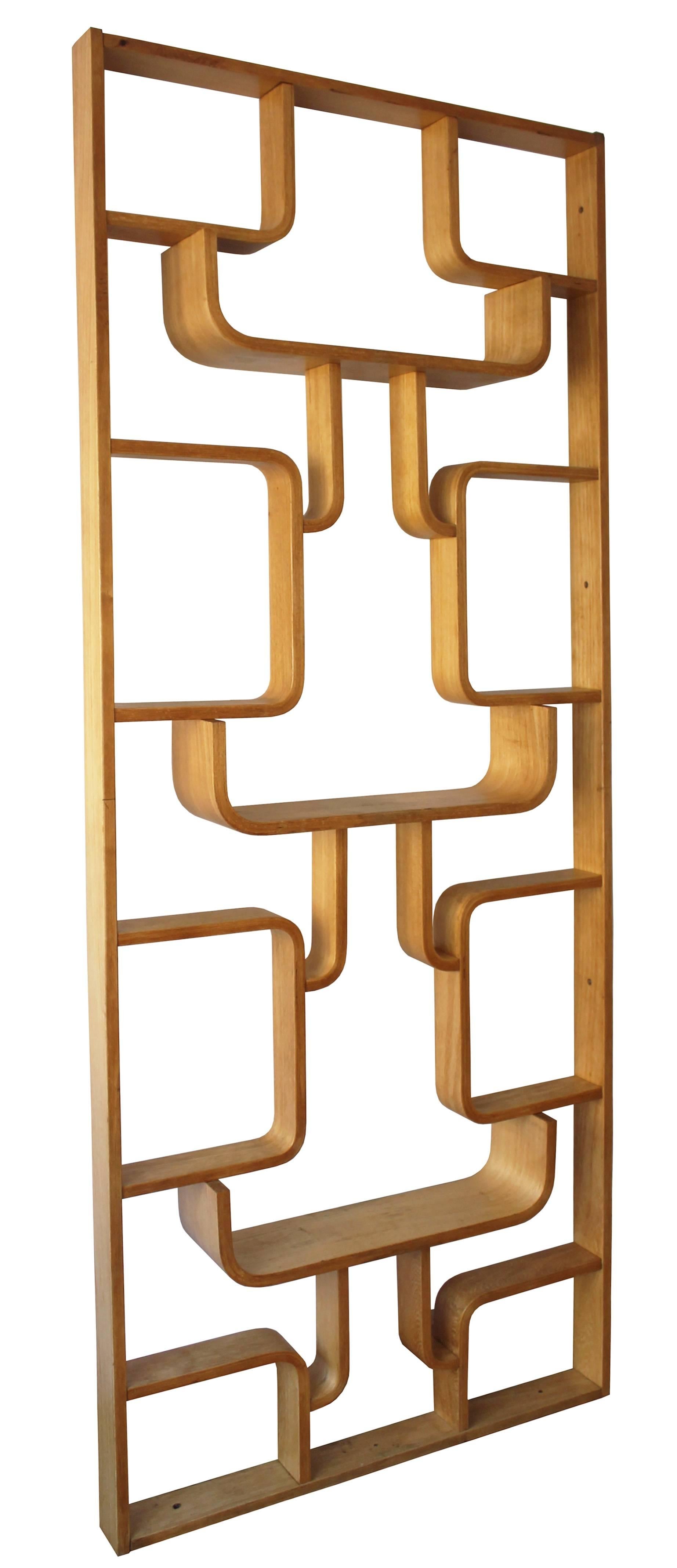 A wall divider designed by Czech architect, Ludvik Volak and manufactured by Drevopodnik Holešov, Czechoslovakia in the 1960s. A perfect sculptural piece that can be used as a plant stand, a wall divider, shelving or simply just for