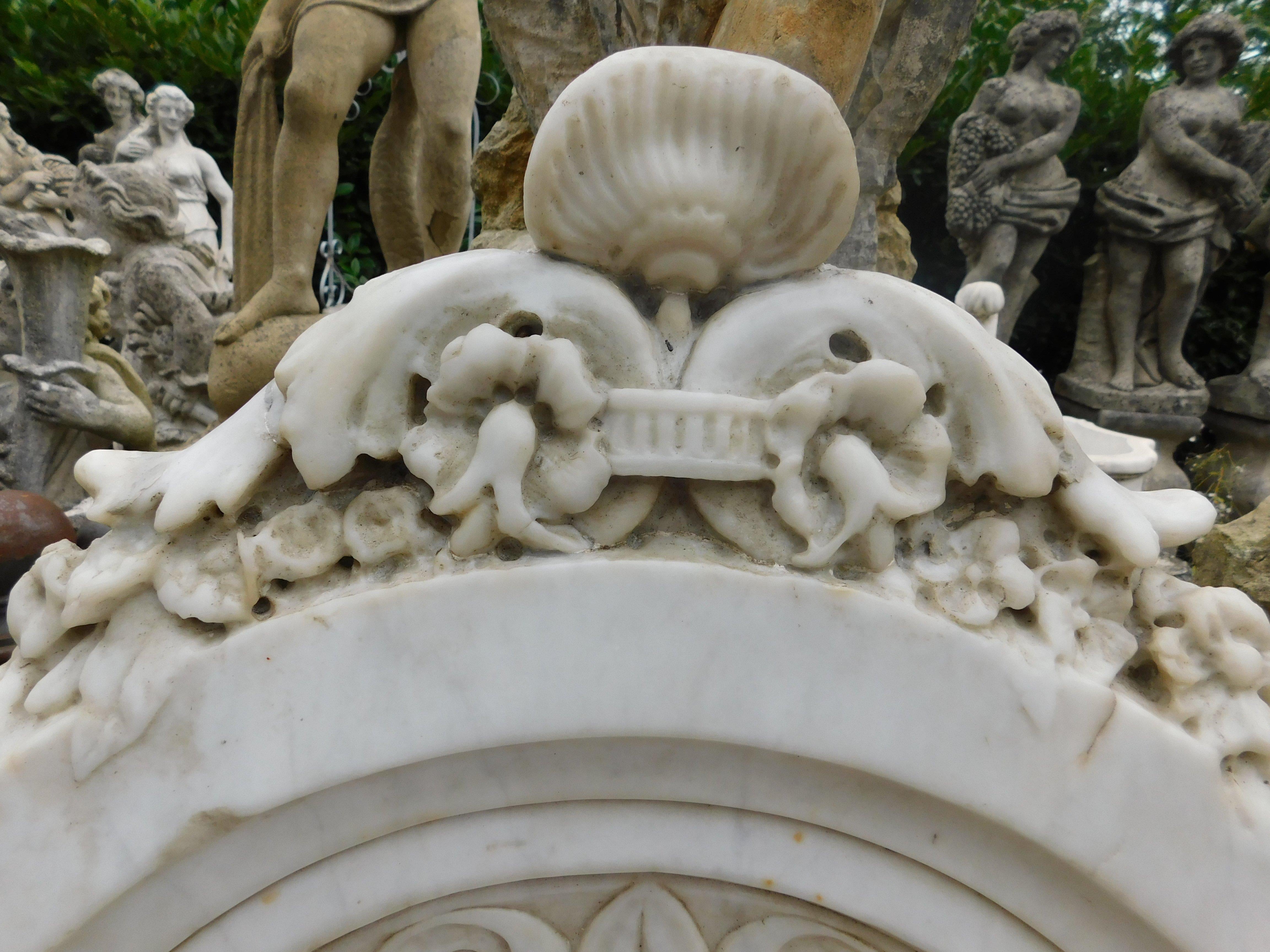 Carrara Marble Wall fountain in white Carrara marble, carved with leaf decorations, Italy For Sale