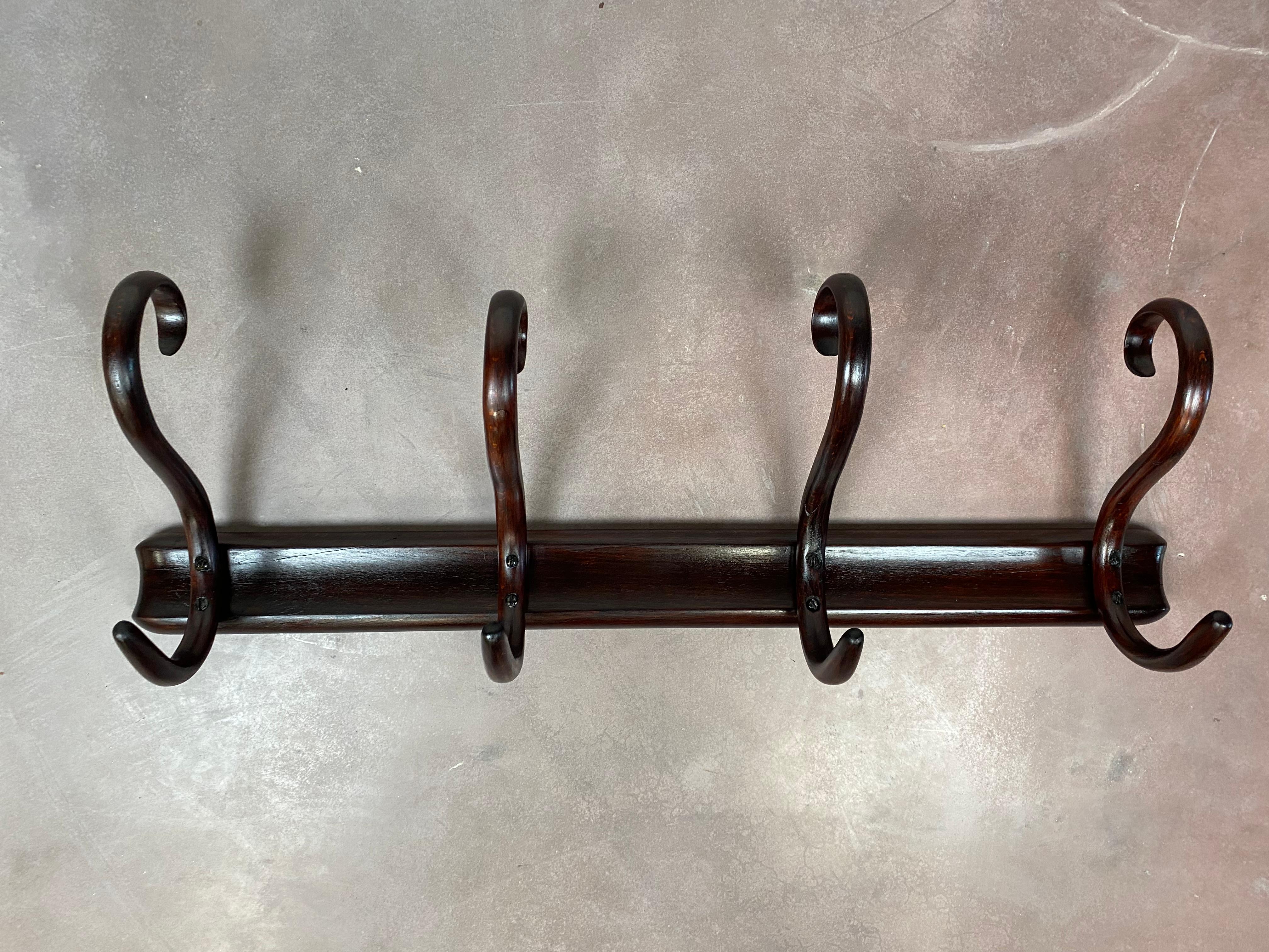 Wall hanger Thonet no.2 professionally stained and repolished.
