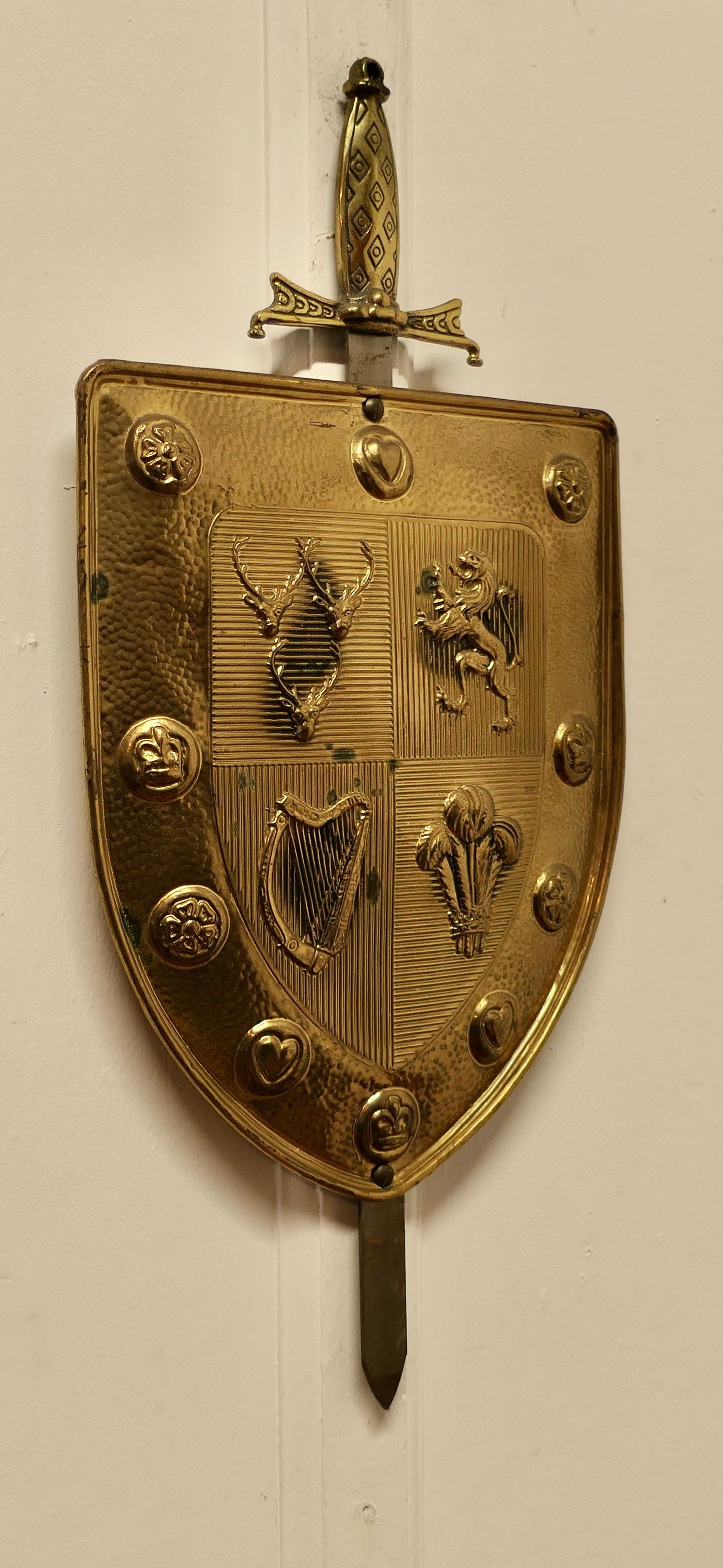Folk Art  Wall Hanging Arts and Crafts Brass Shield with Sword   For Sale