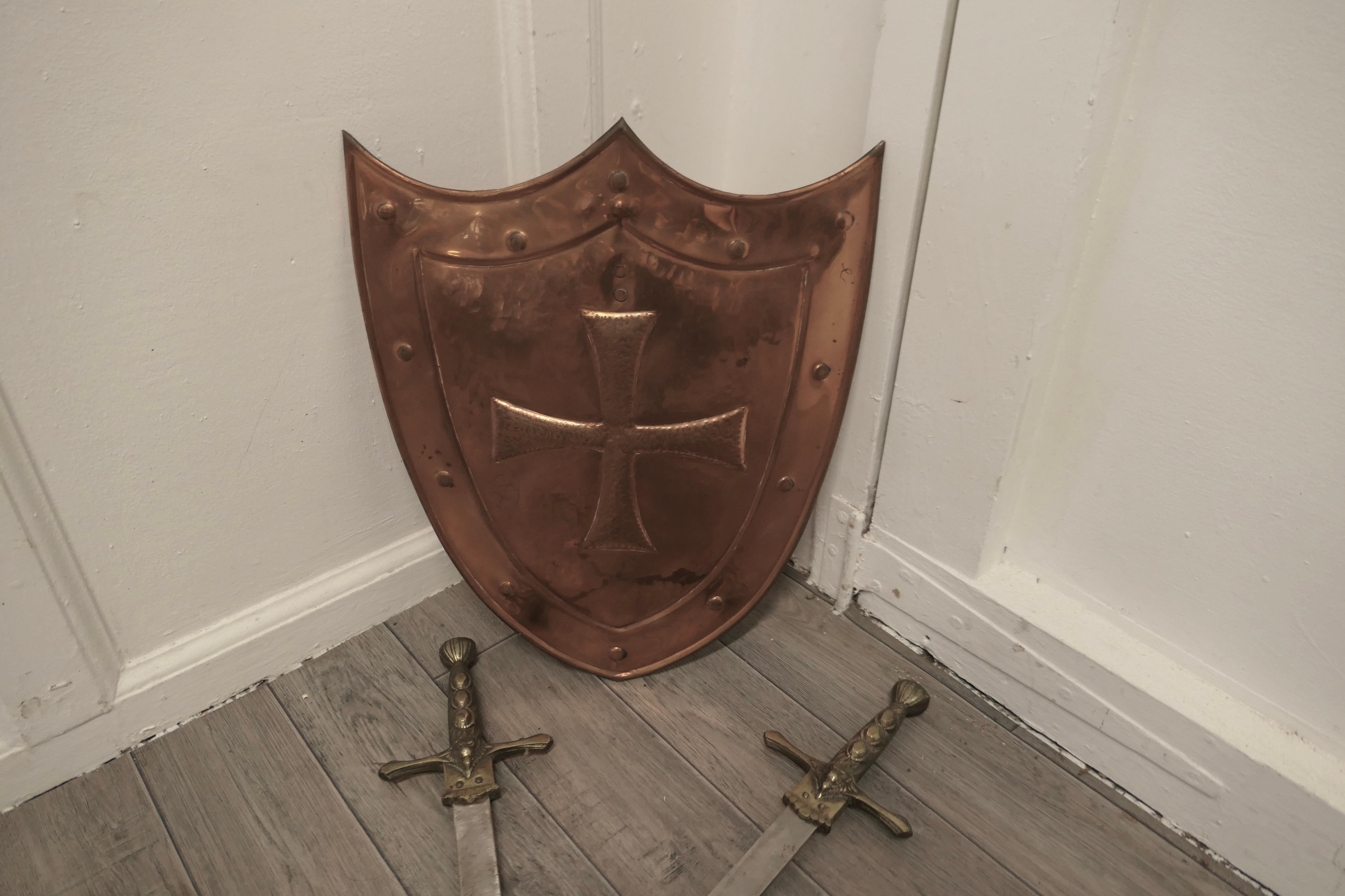 Late 19th Century Wall Hanging Arts and Crafts Copper Shield with Cross Swords For Sale