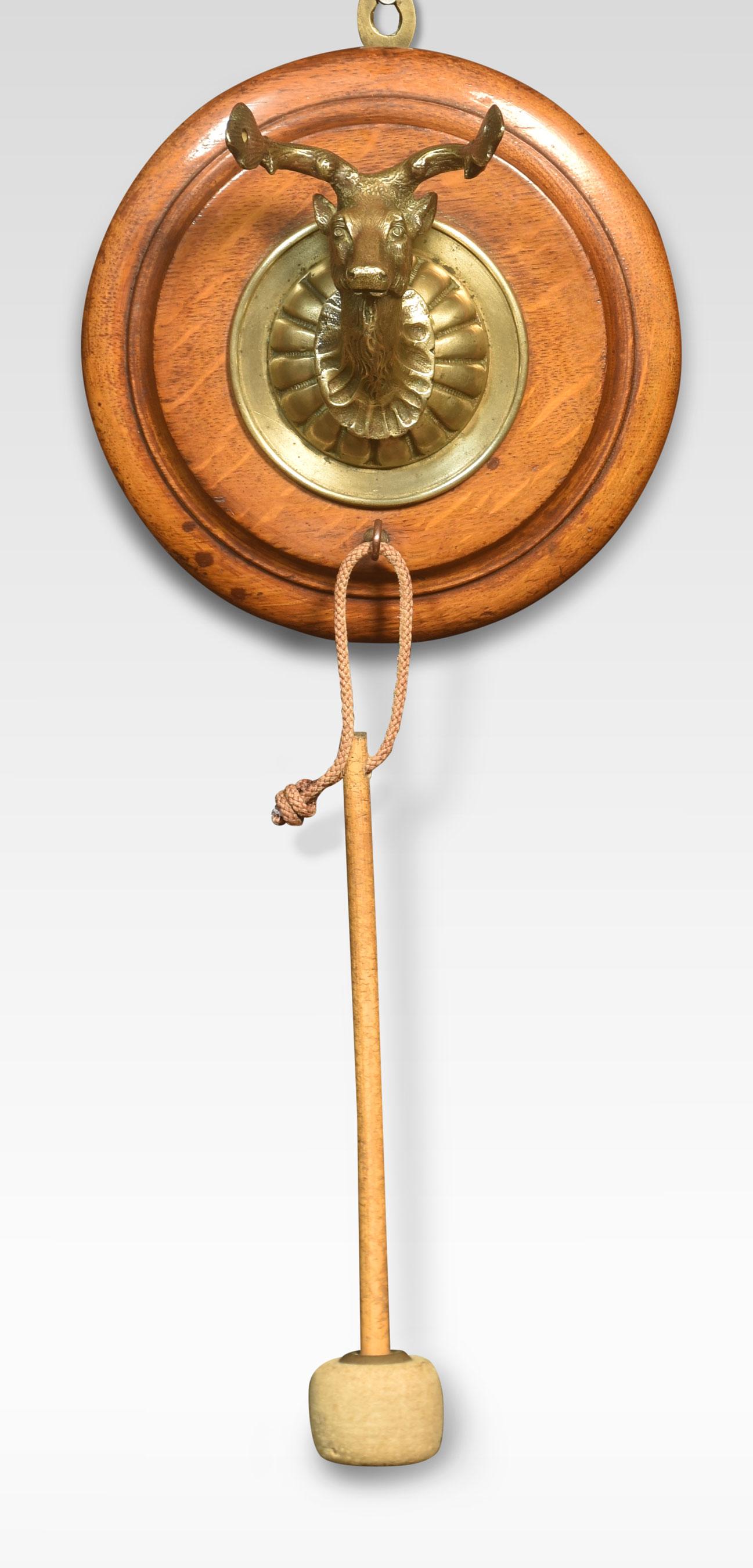 Wall hanging dinner gong, the oak backplate with stags head supporting the circular gong. Together with a hammer.
Dimensions
Height 21 Inches
Width 10 Inches
Depth 6 Inches