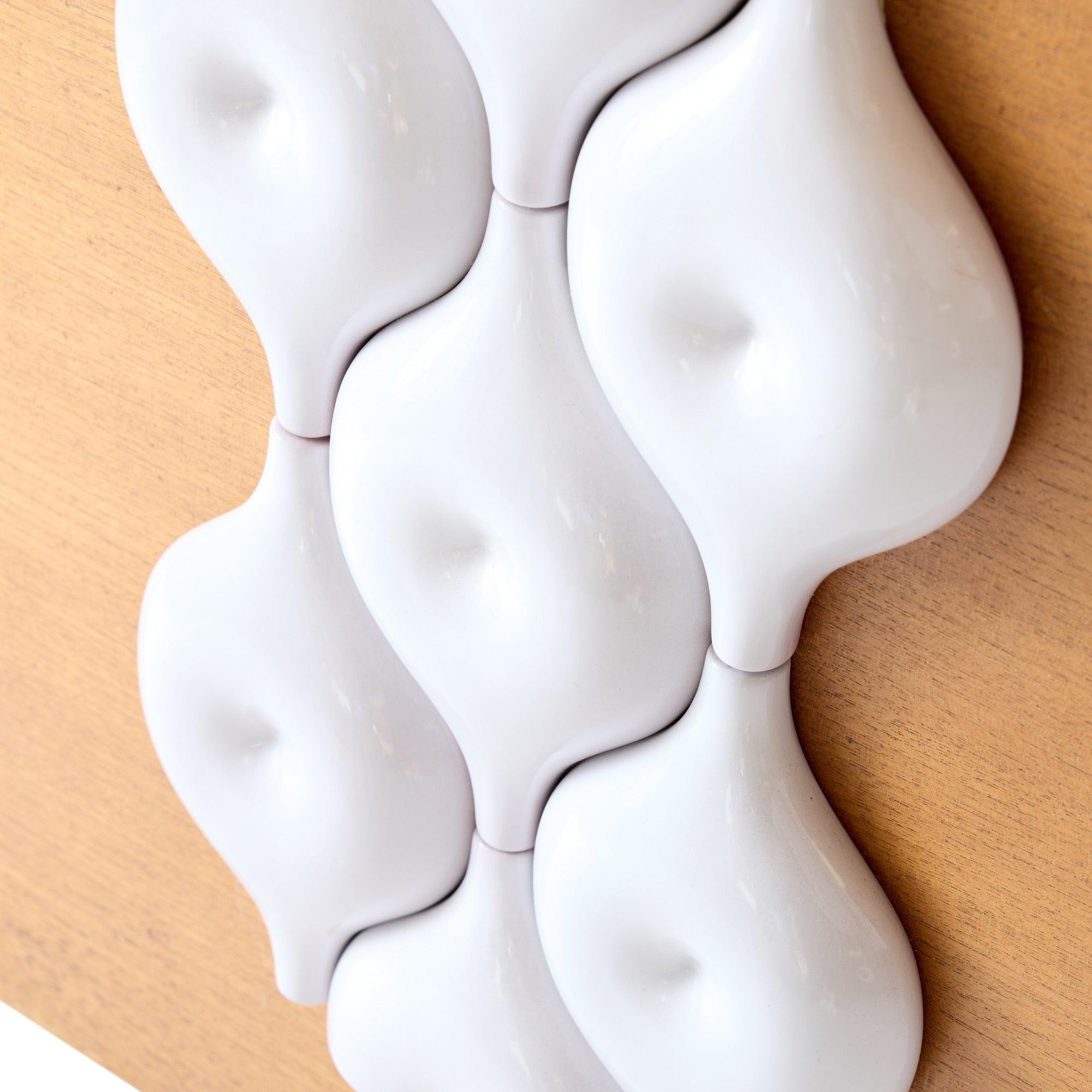 Unique wall hanging of ceramic prototypes.