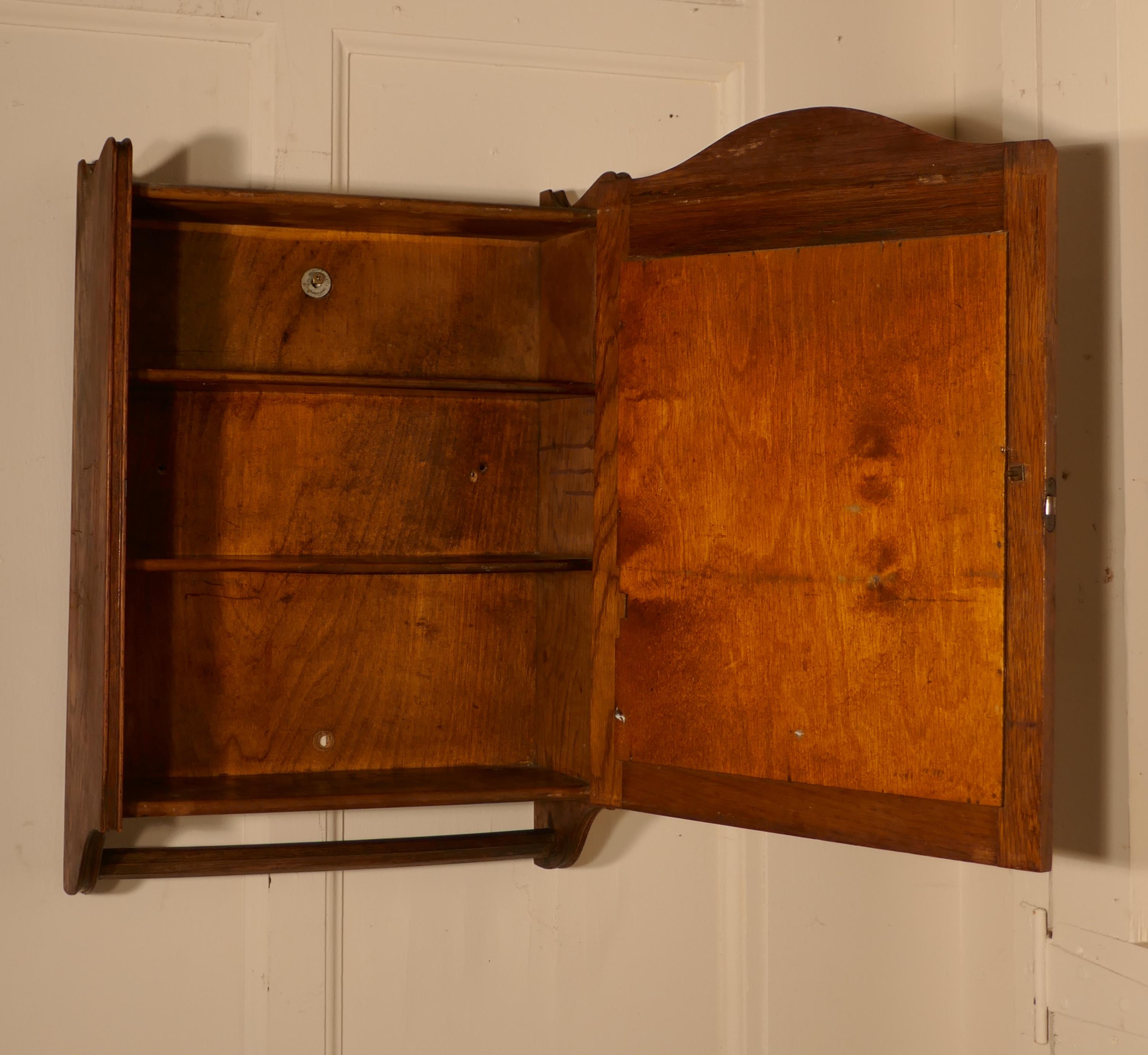 Edwardian Wall Hanging Oak Cloakroom or Bathroom Cupboard from the Initial Towel Supply Co