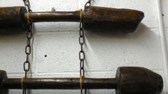 Wall Hanging of Antique Wooden Pestles