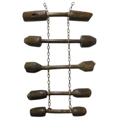 Wall Hanging of Antique Wooden Pestles