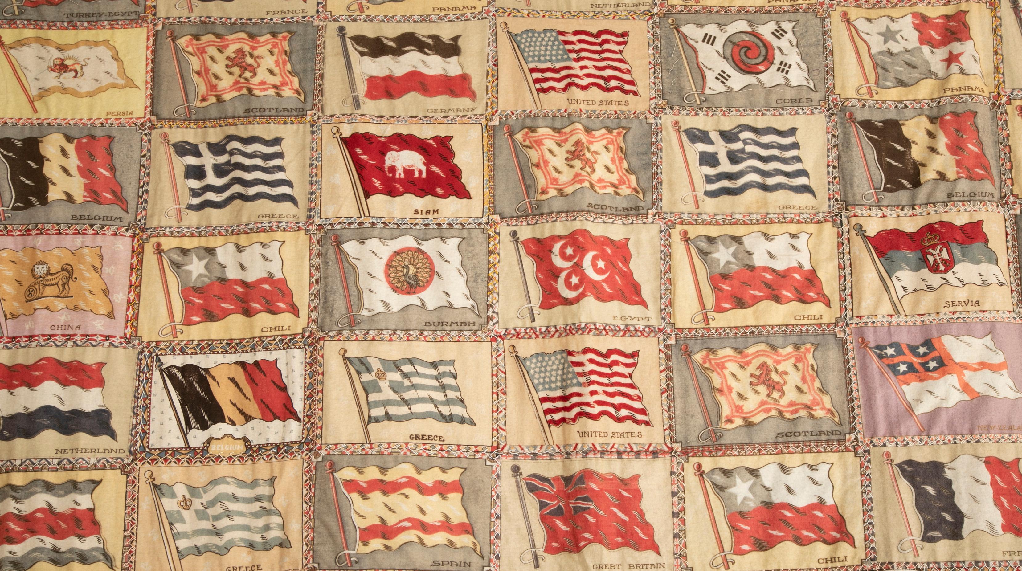 Early 20th Century Wall Hanging / Quilt Composed of Cigar Box Painted Felt Flags For Sale